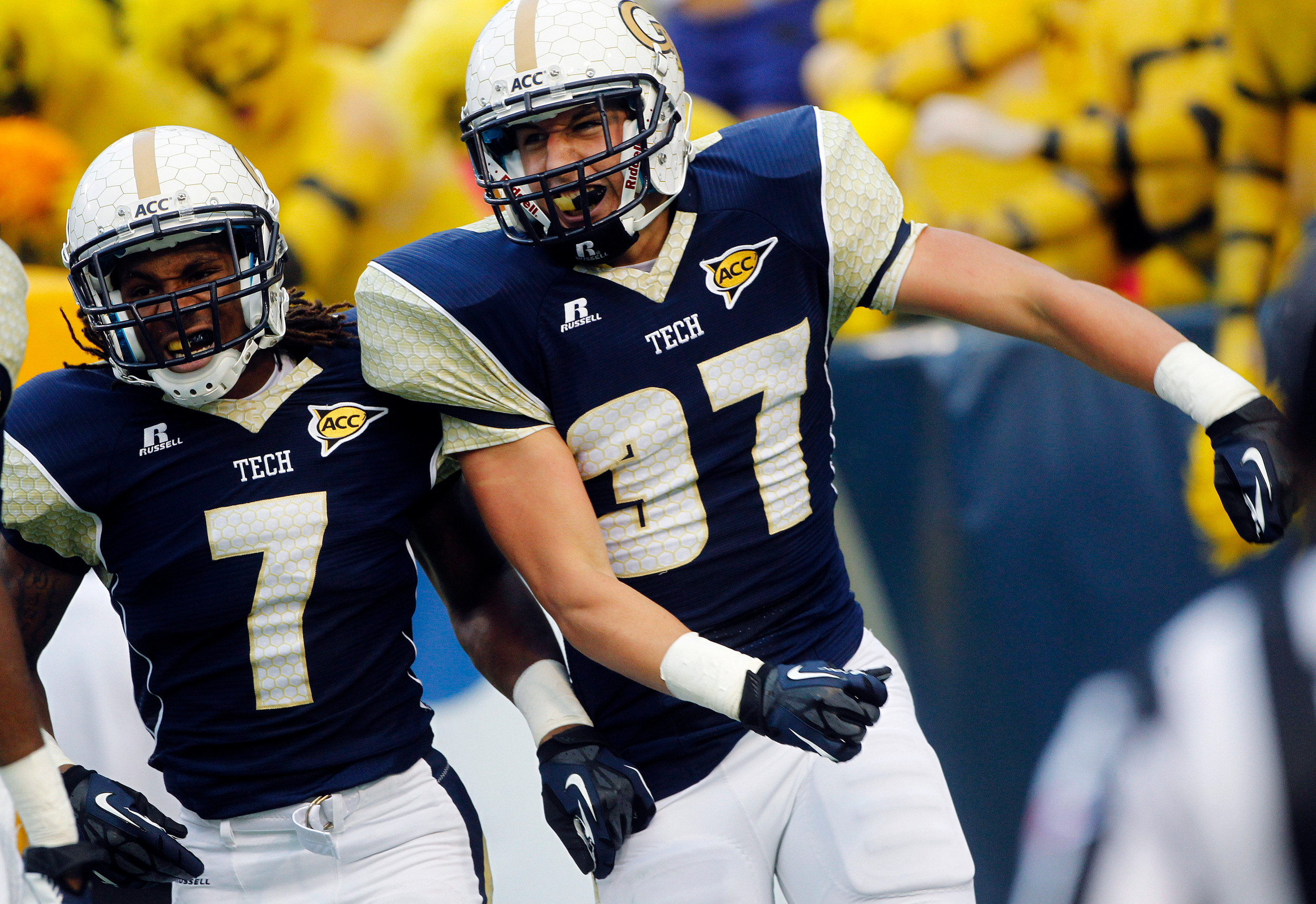 Georgia Tech running back Zach Laskey (37) reacts with B.J. Bostic (7) after rushing for a touchdown in the first half. (AP Photo/John Bazemore)