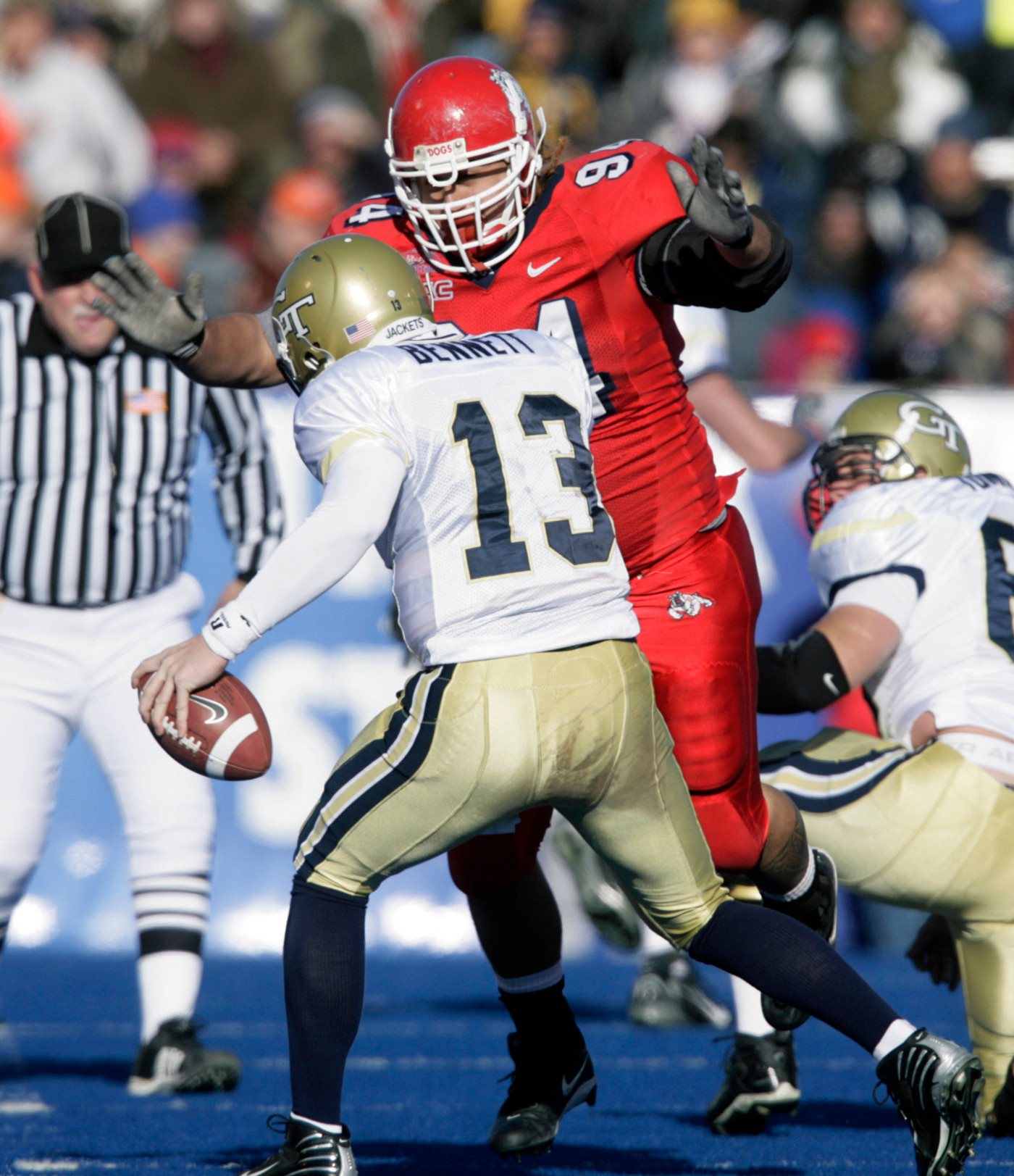 Georgia Tech's Taylor Bennett is sacked by Fresno State's Jon Monga during the first half.