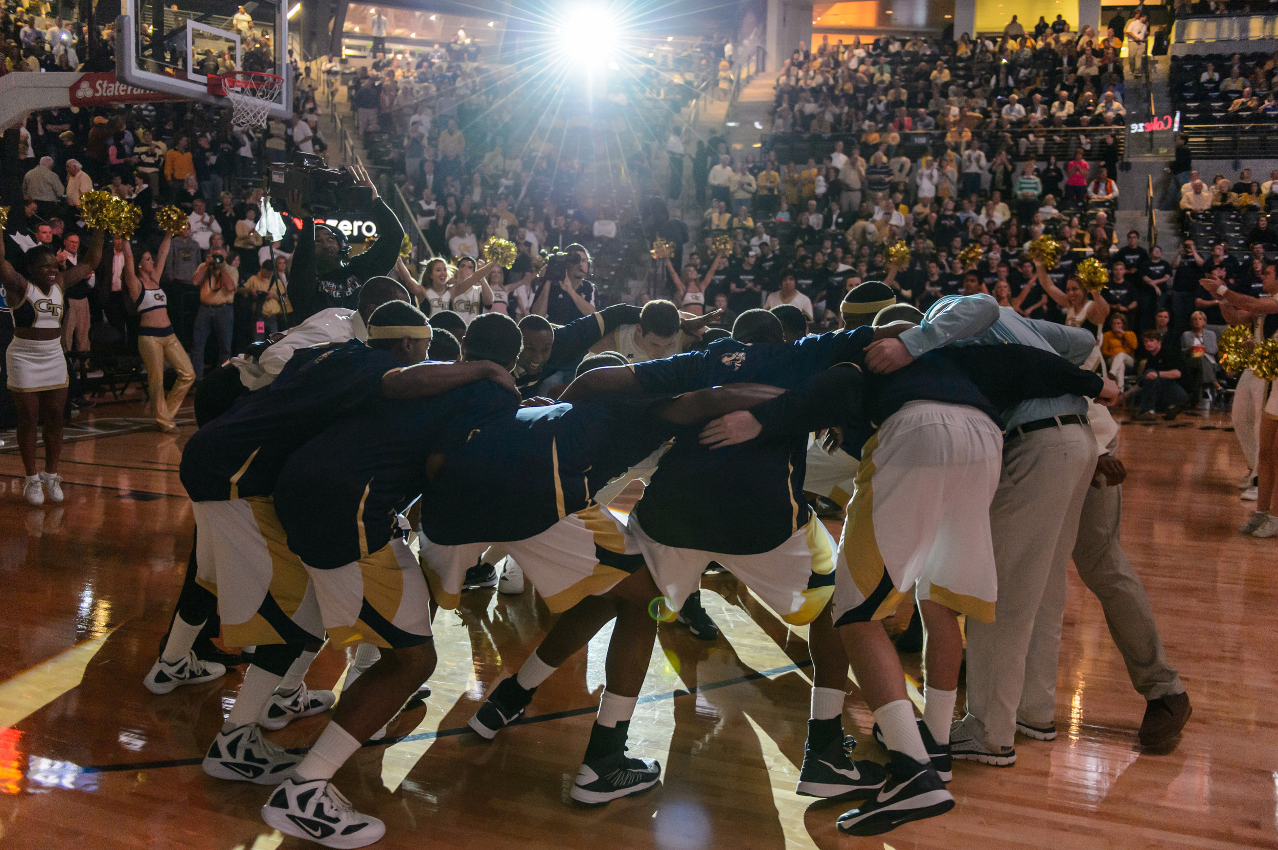The Yellow Jackets huddle before the game.