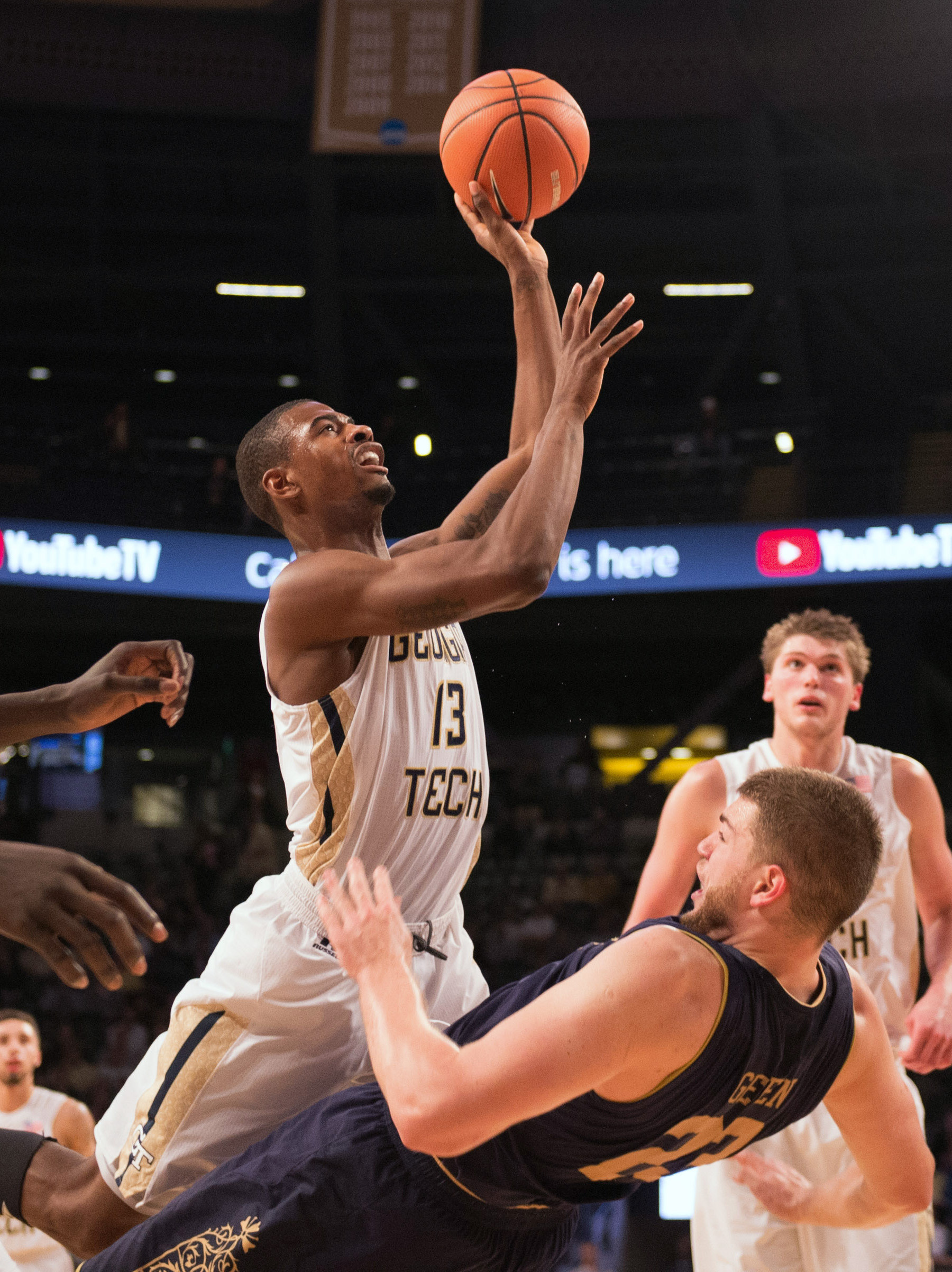 Jan 10, 2018; Atlanta, GA, USA; Georgia Tech Yellow Jackets guard Curtis Haywood II (13) goes against Notre Dame Fighting Irish forward Martinas Geben (23) during the first half at McCamish Pavilion. Mandatory Credit: Adam Hagy-USA TODAY Sports
