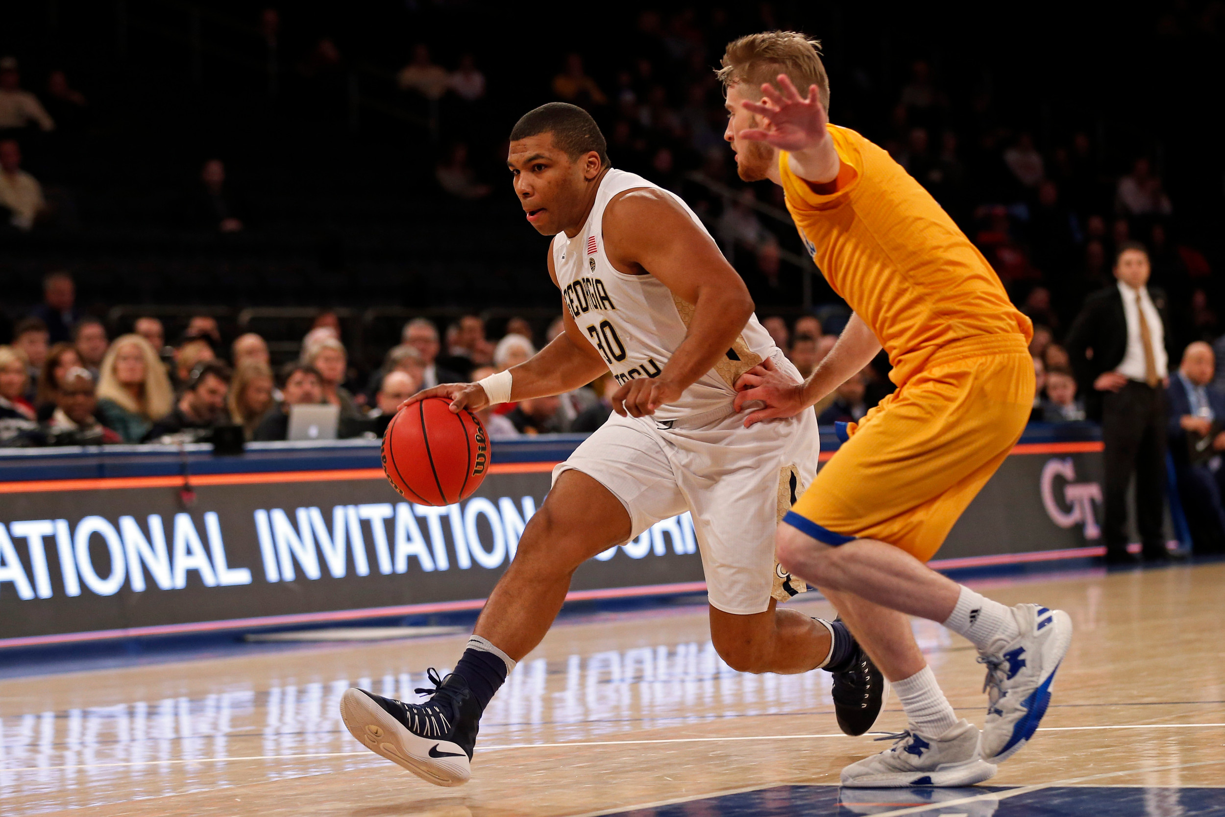 Guard Corey Heyward drives to the basket past Cal State Bakersfield Roadrunners guard Brent Wrapp during the first half in the semifinals of the 2017 NIT Tournament at Madison Square Garden. Credit: Adam Hunger-USA TODAY Sports