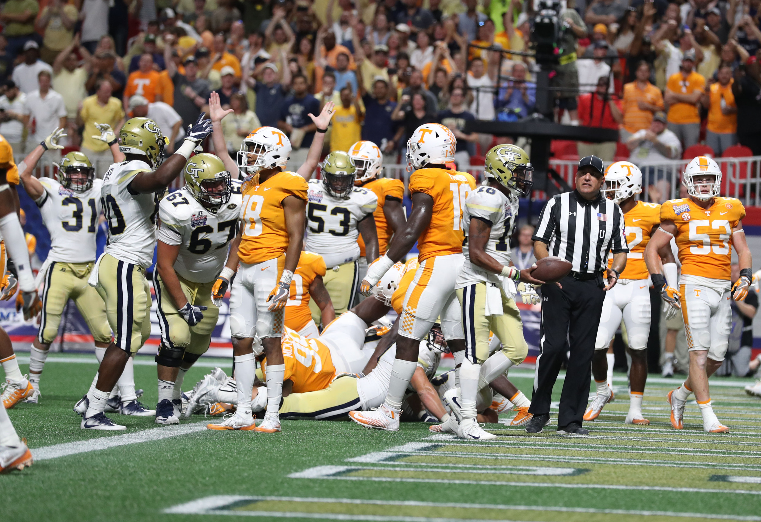 Sep 4, 2017; Atlanta, GA, USA; Georgia Tech Yellow Jackets quarterback TaQuon Marshall (16) reacts after scoring a touchdown against the Tennessee Volunteers during the third quarter at Mercedes-Benz Stadium. Mandatory Credit: Jason Getz-USA TODAY Sports