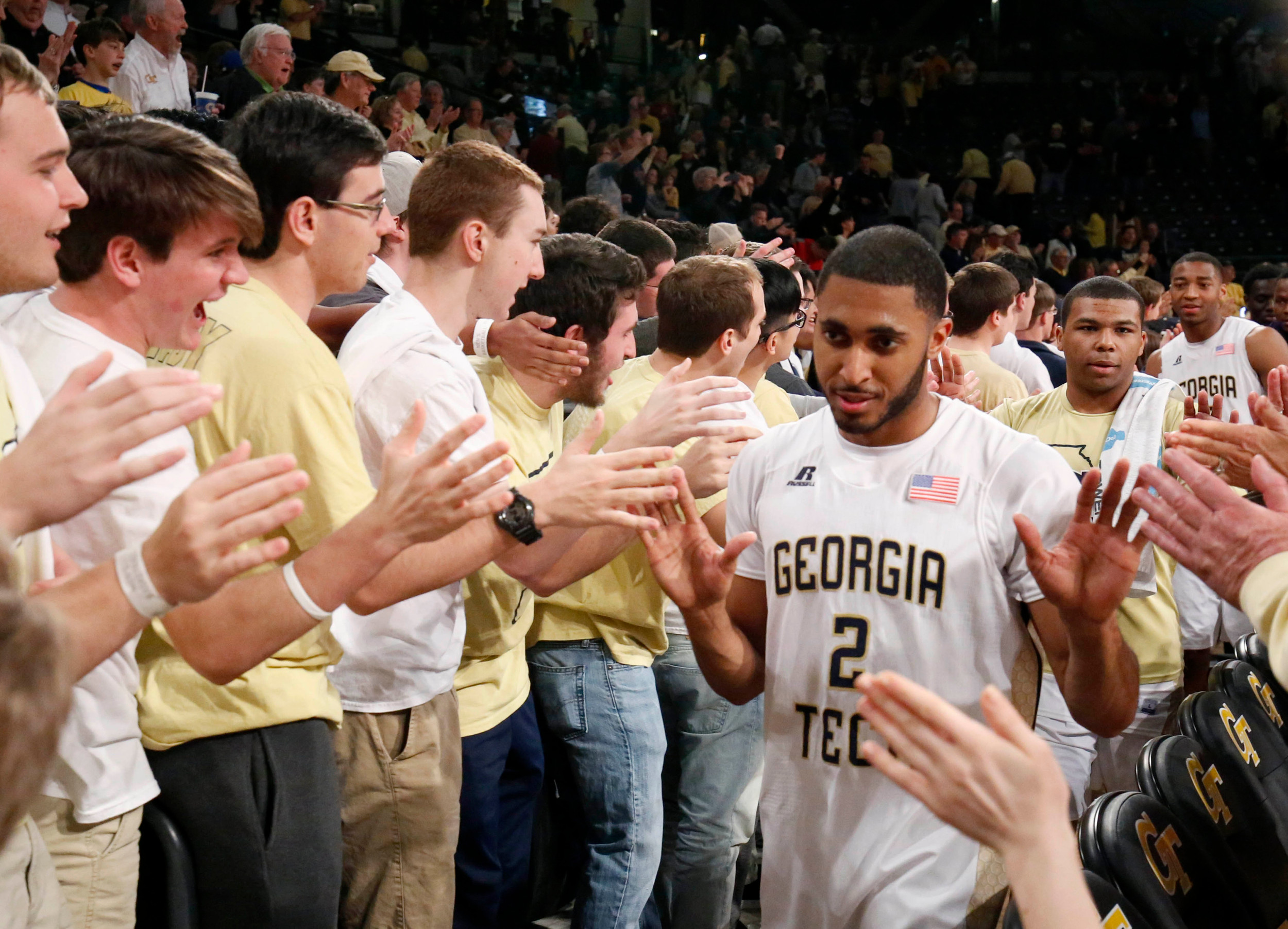 Mar 5, 2016; Atlanta, GA, USA; Georgia Tech Yellow Jackets guard Adam Smith (2) celebrate their win against the Pittsburgh Panthers at McCamish Pavilion. Credit: Jason Getz-USA TODAY Sports