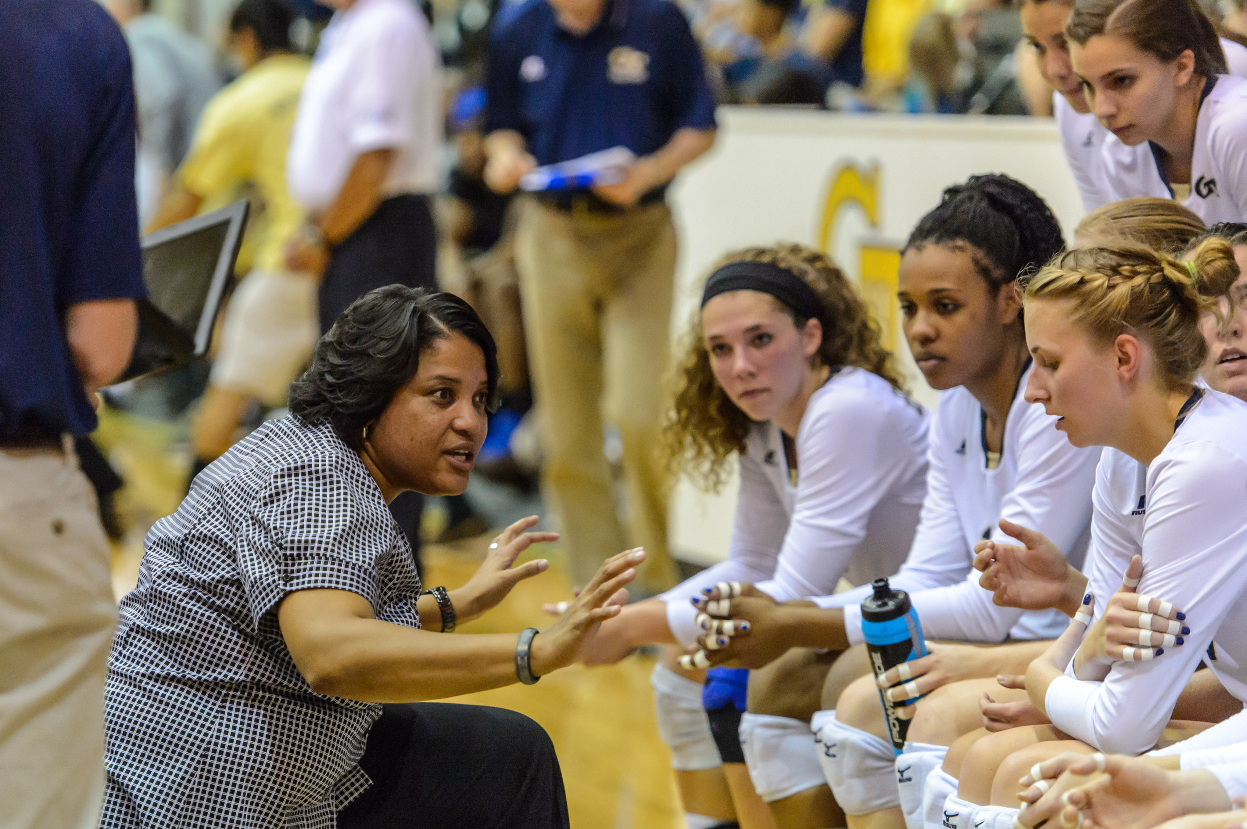 Coach Tonya Johnson speaks to the team during a timeout.
