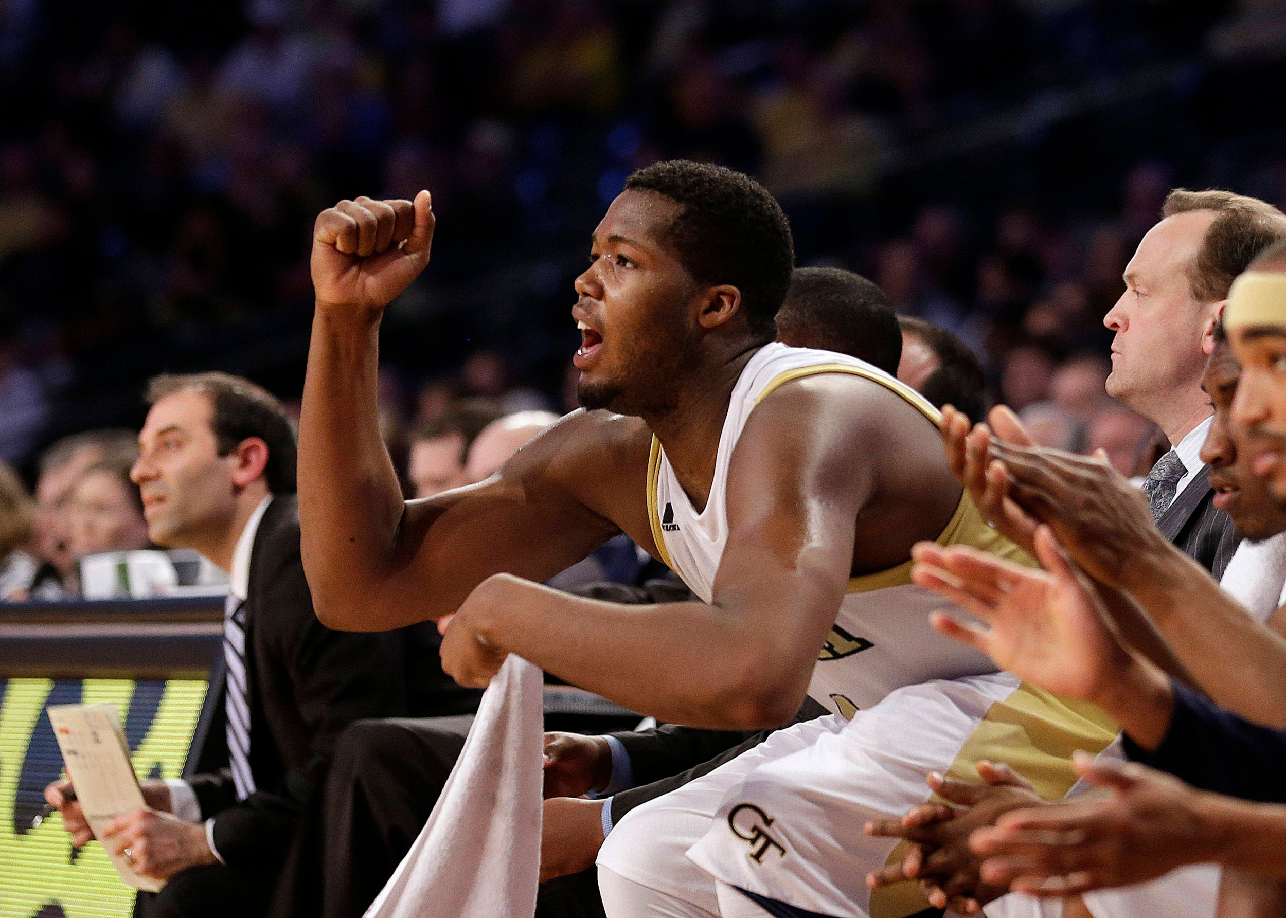 Georgia Tech forward Robert Carter reacts from the bench after a Tech basket in the second half. (AP Photo/John Bazemore)