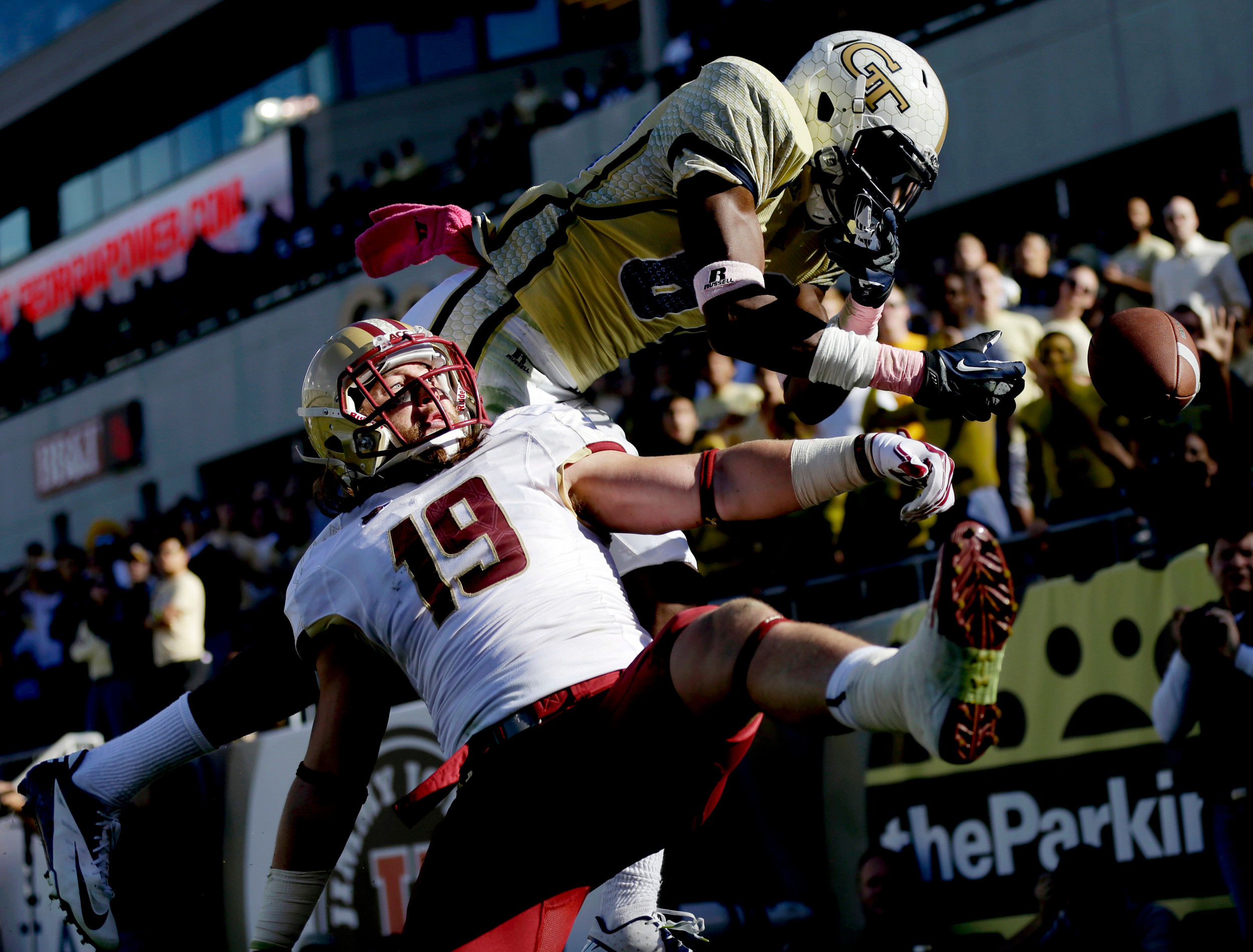 A pass intended for Georgia Tech wide receiver Jeff Greene, right, is broken up by Boston College defensive back Sean Sylvia during the second quarter. (AP Photo/David Goldman)