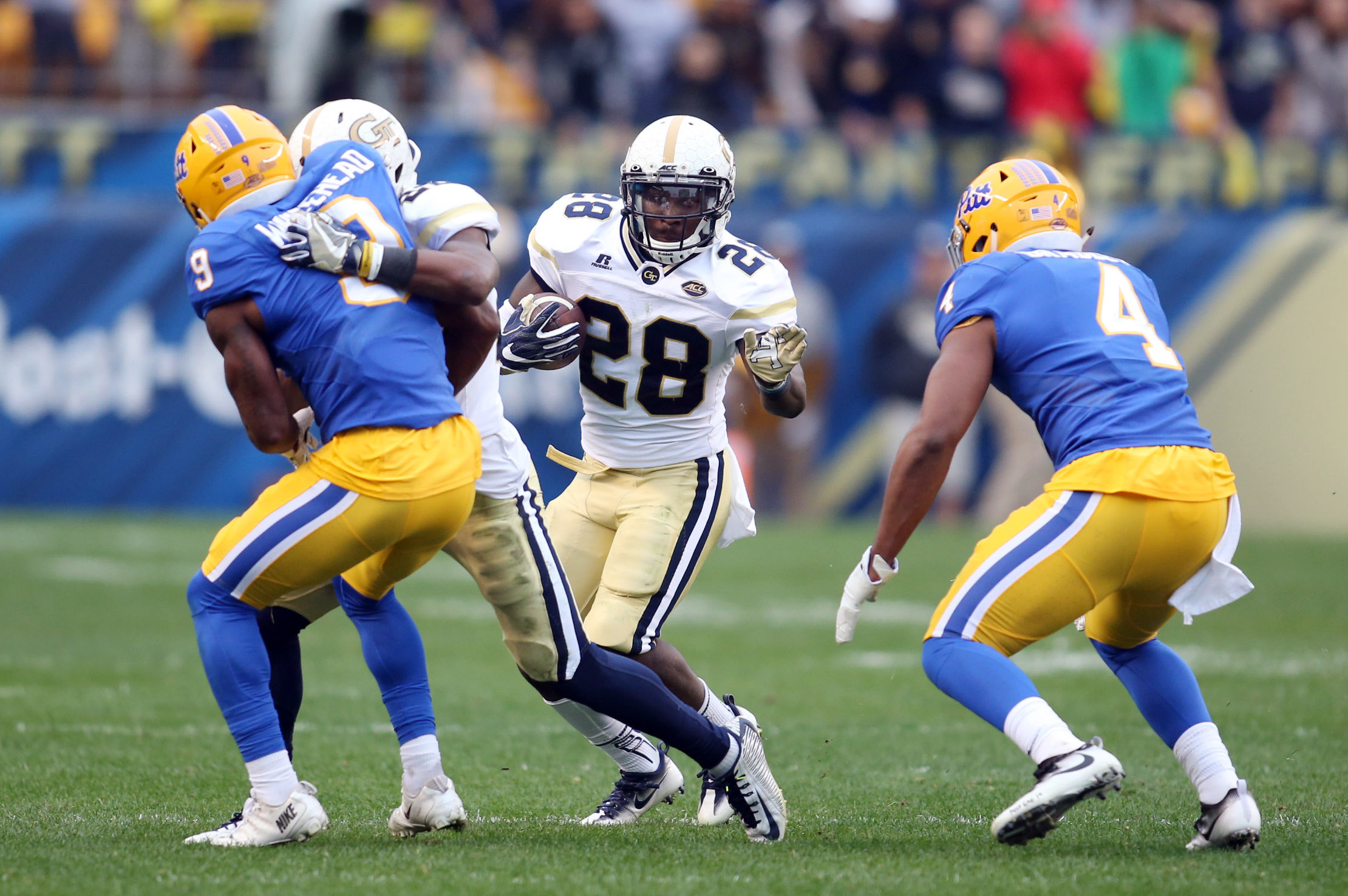Georgia Tech running back J.J. Green (28) rushes the ball against the Pittsburgh Panthers during the second quarter at Heinz Field. Charles LeClaire-USA TODAY Sports
