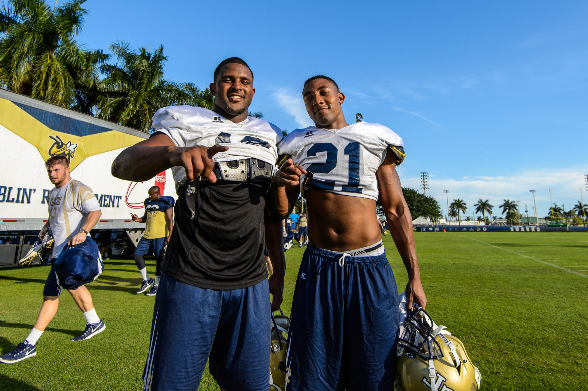 Seniors Synjyn Days (10) and Charles Perkins (21) pose after their final practice as Yellow Jackets