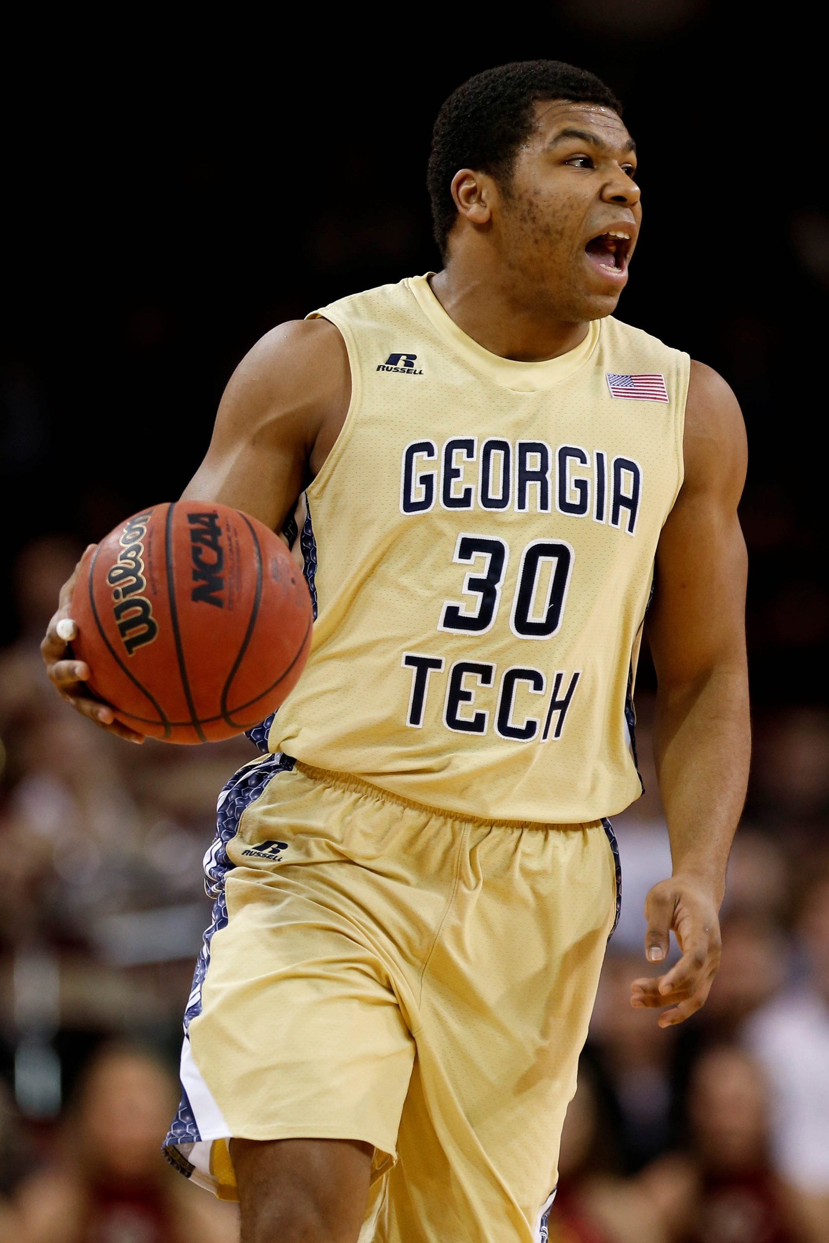Jan 21, 2014; Chestnut Hill, MA, USA; Georgia Tech Yellow Jackets guard Corey Heyward (30) brings the ball up court during the first half against the Boston College Eagles at Silvio O. Conte Forum. Mandatory Credit: Greg M. Cooper-USA TODAY Sports