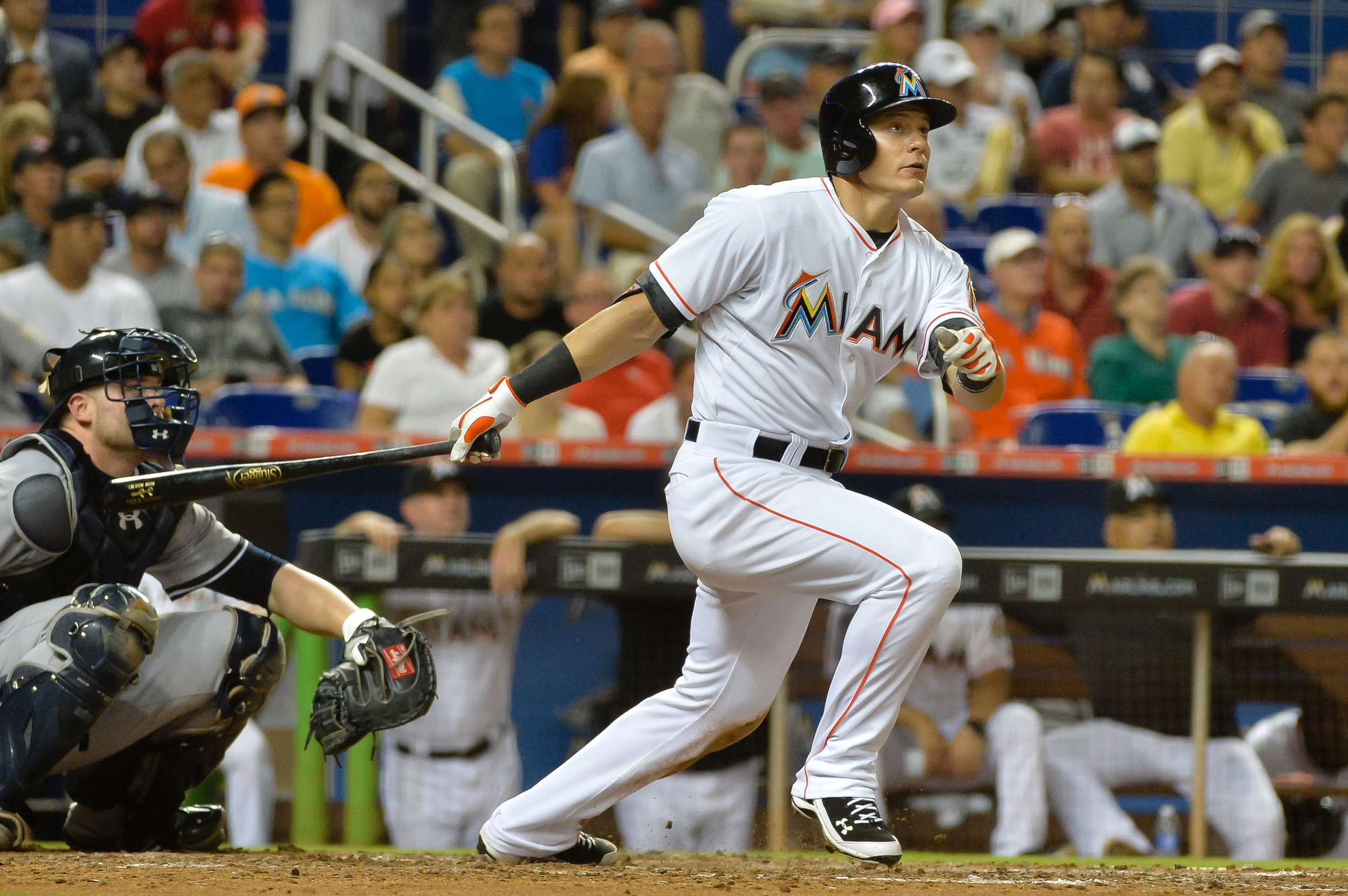Jun 15, 2015; Miami, FL, USA; Miami Marlins third baseman Derek Dietrich (32) connects for a solo home run during the seventh inning against the New York Yankees at Marlins Park. Credit: Steve Mitchell-USA TODAY Sports