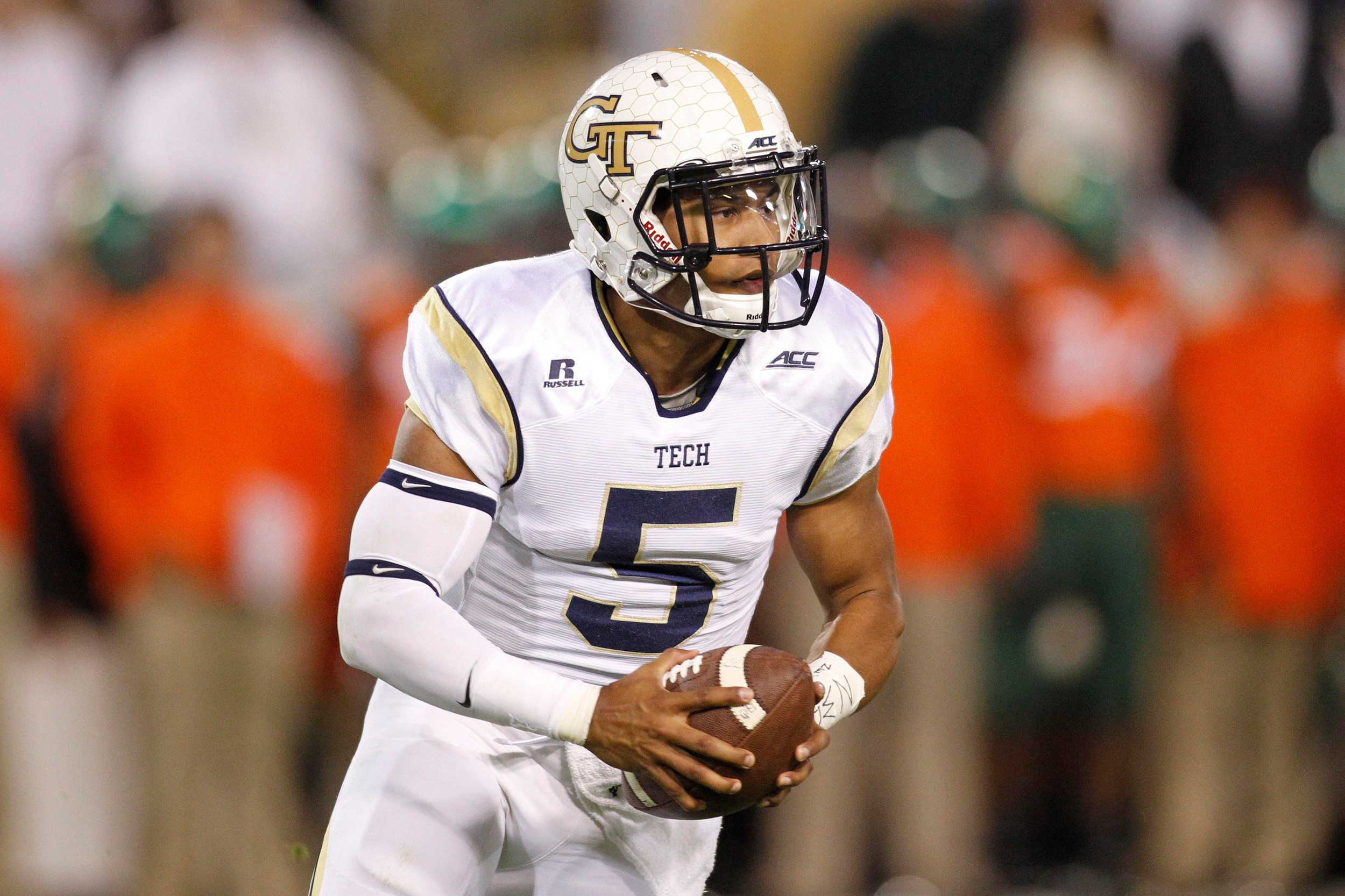 Oct 4, 2014; Atlanta, GA, USA; Yellow Jackets quarterback Justin Thomas (5) runs the ball in the first quarter. Brett Davis-USA TODAY Sports