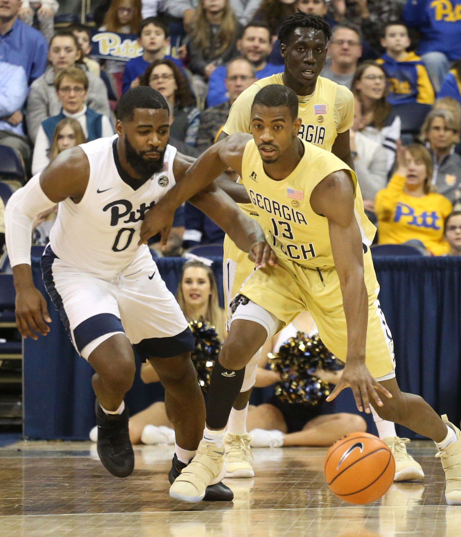 Jan 13, 2018; Pittsburgh, PA, USA; Georgia Tech Yellow Jackets guard Curtis Haywood II (13) dribbles the ball against Pittsburgh Panthers guard Jared Wilson-Frame (0) during the first half at the Petersen Events Center. The Yellow Jackets won 69-54. Mandatory Credit: Charles LeClaire-USA TODAY Sports