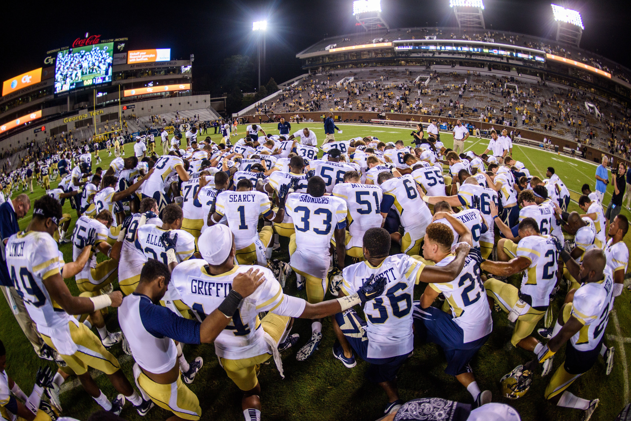 The team gathers at midfield after the win
