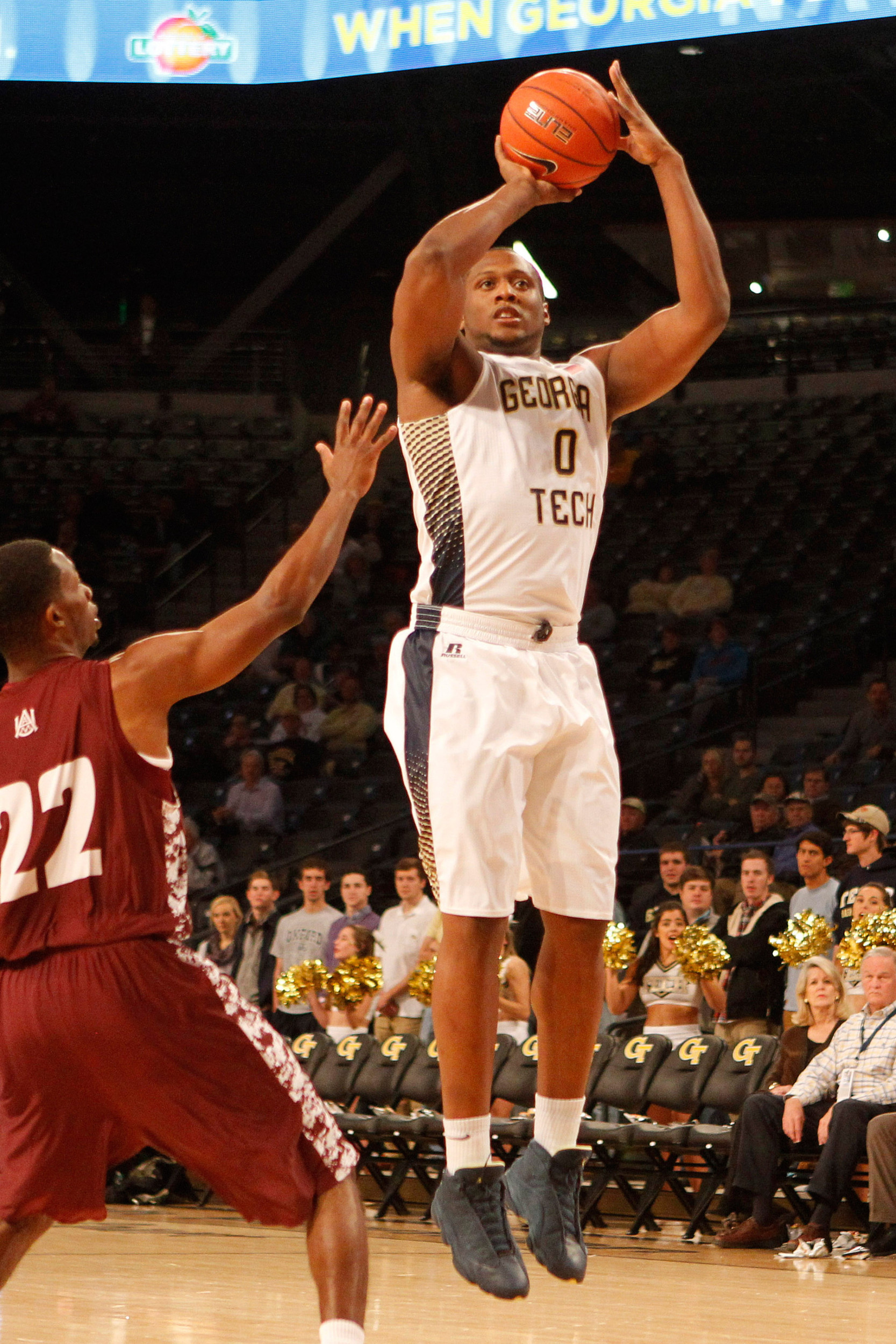 Nov 18, 2014; Atlanta, GA, USA; Yellow Jackets forward Charles Mitchell (0) shoots the ball in the first half. Brett Davis-USA TODAY Sports