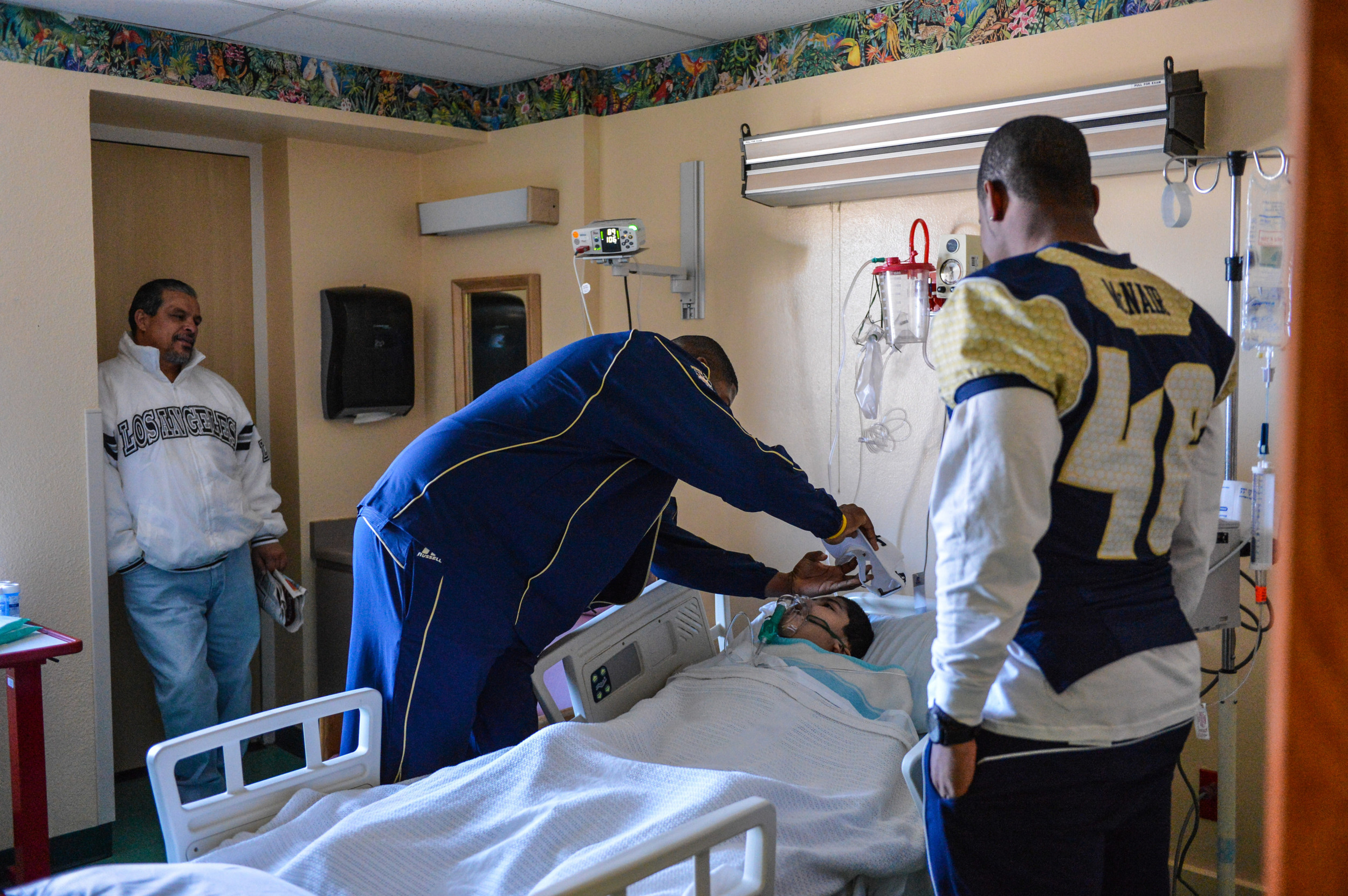 Coach Paul Johnson and 27 Yellow Jacket Football players visited Providence Memorial Hospital in El Paso to spread some Georgia Tech cheer to the children there.