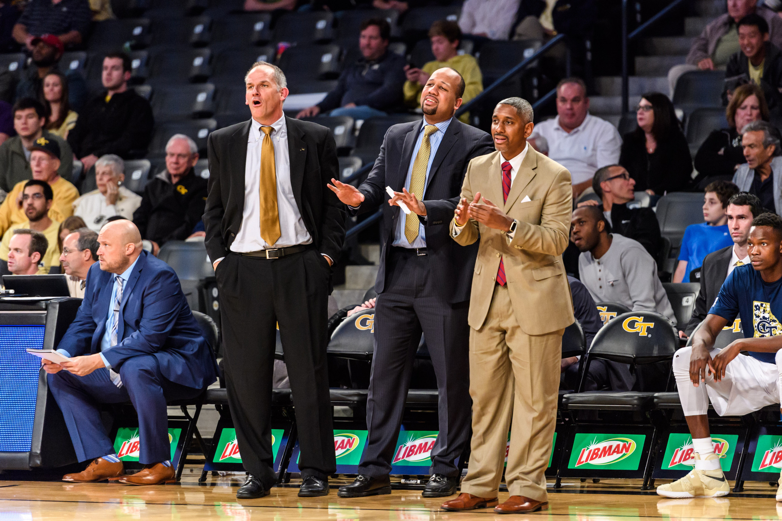 Assistant Coaches Tavaras Hardy, Darryl LaBarrie, and Eric Reveno