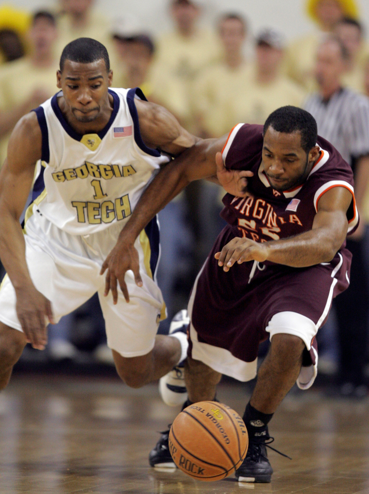 Virginia Tech's Jamon Gordon, right, and Georgia Tech's Javaris Crittenton chase down a loose ball in the first half of a college basketball game Sunday, Jan. 28, 2007, in Atlanta. (AP Photo/John Bazemore)