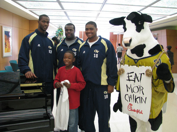 Yellow Jackets visit children at Egleston Hospital.