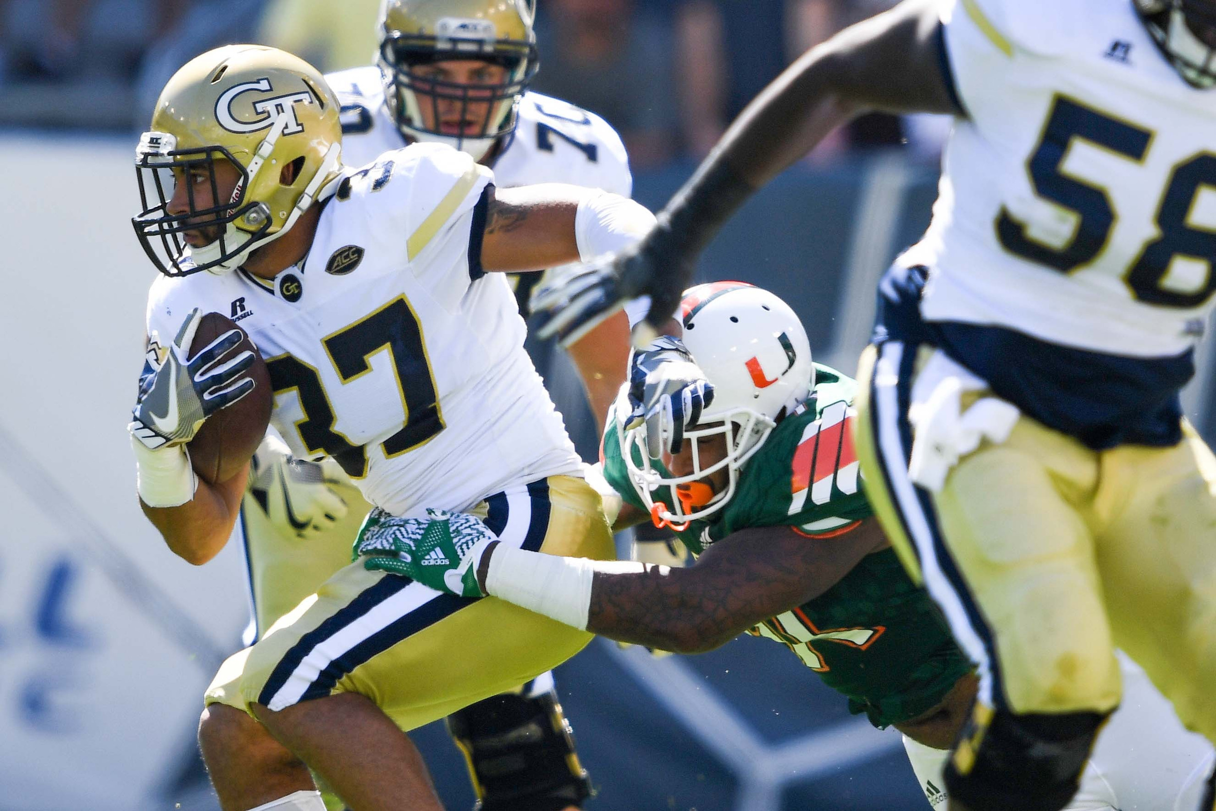 Yellow Jackets wide receiver Mikell Lands-Davis (37) runs the ball during the first quarter. Shanna Lockwood-USA TODAY Sports