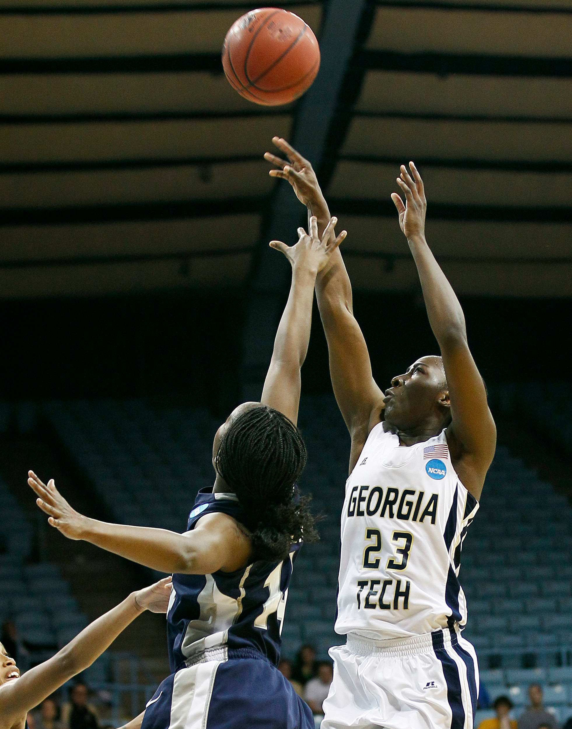 Georgia Tech's Sydney Wallace shoots over Georgetown's Sugar Rodgers during the first half. (AP Photo/Gerry Broome)