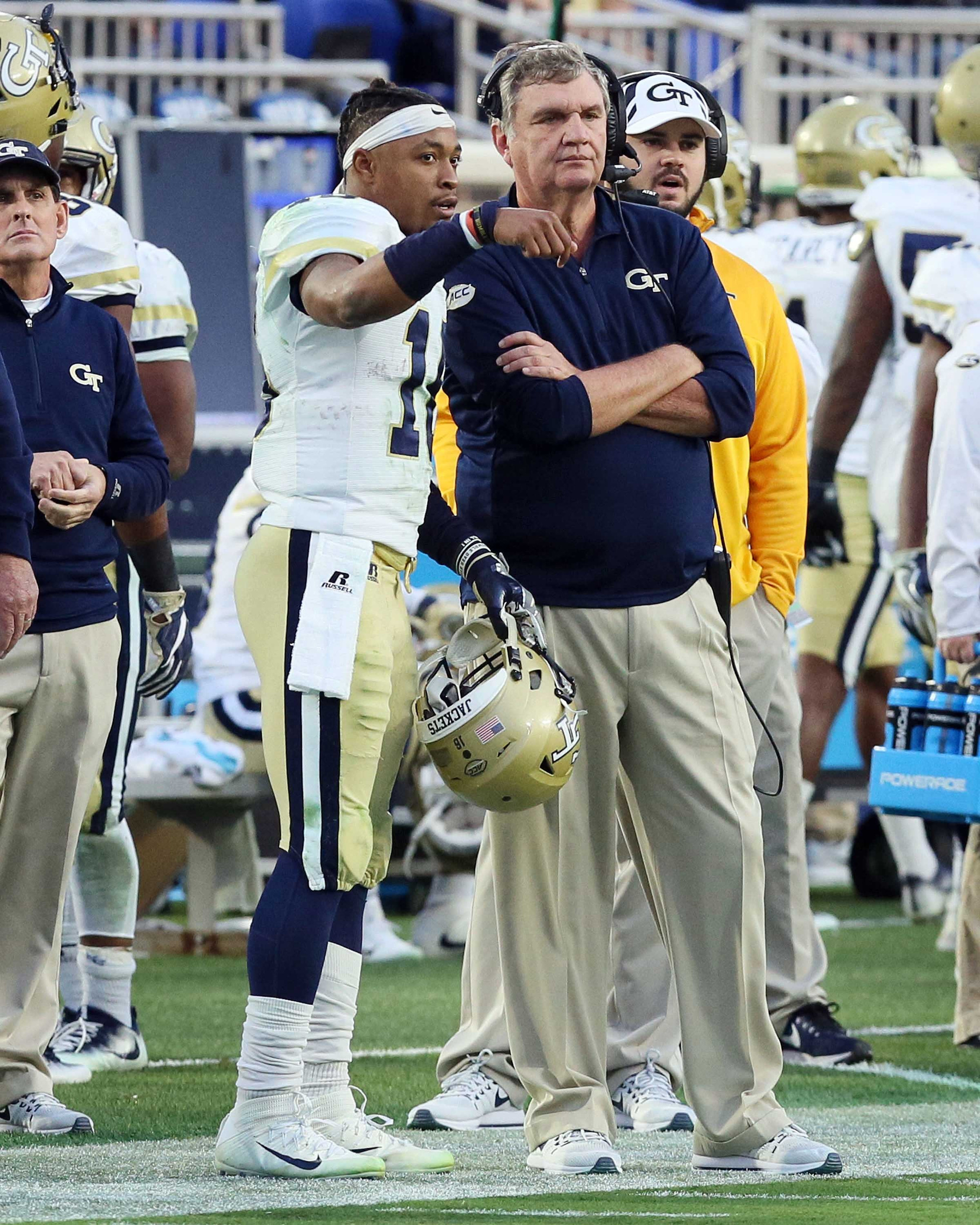 Nov 18, 2017; Durham, NC, USA; Georgia Tech Yellow Jackets quarterback TaQuon Marshall (16) and head coach Paul Johnson talk on the sidelines in the first half against the Duke Blue Devils at Wallace Wade Stadium. Mandatory Credit: Mark Dolejs-USA TODAY Sports