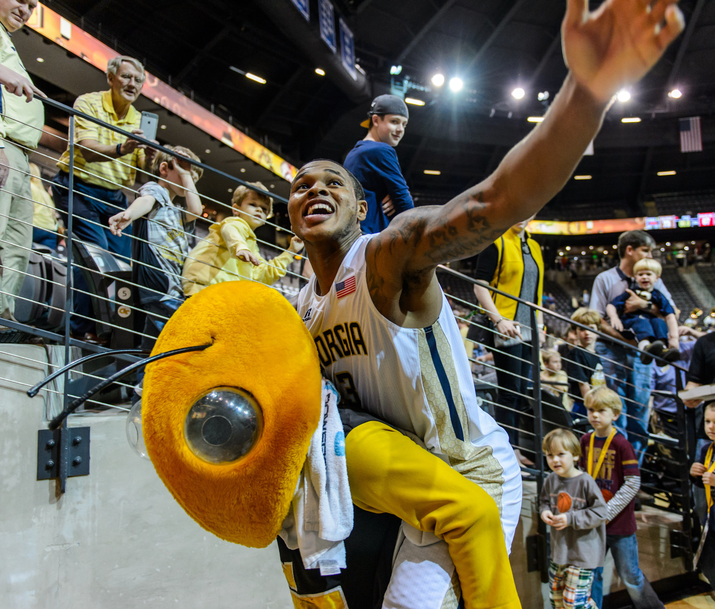 Marcus Georges-Hunt (3) gets a ride from Buzz after the win