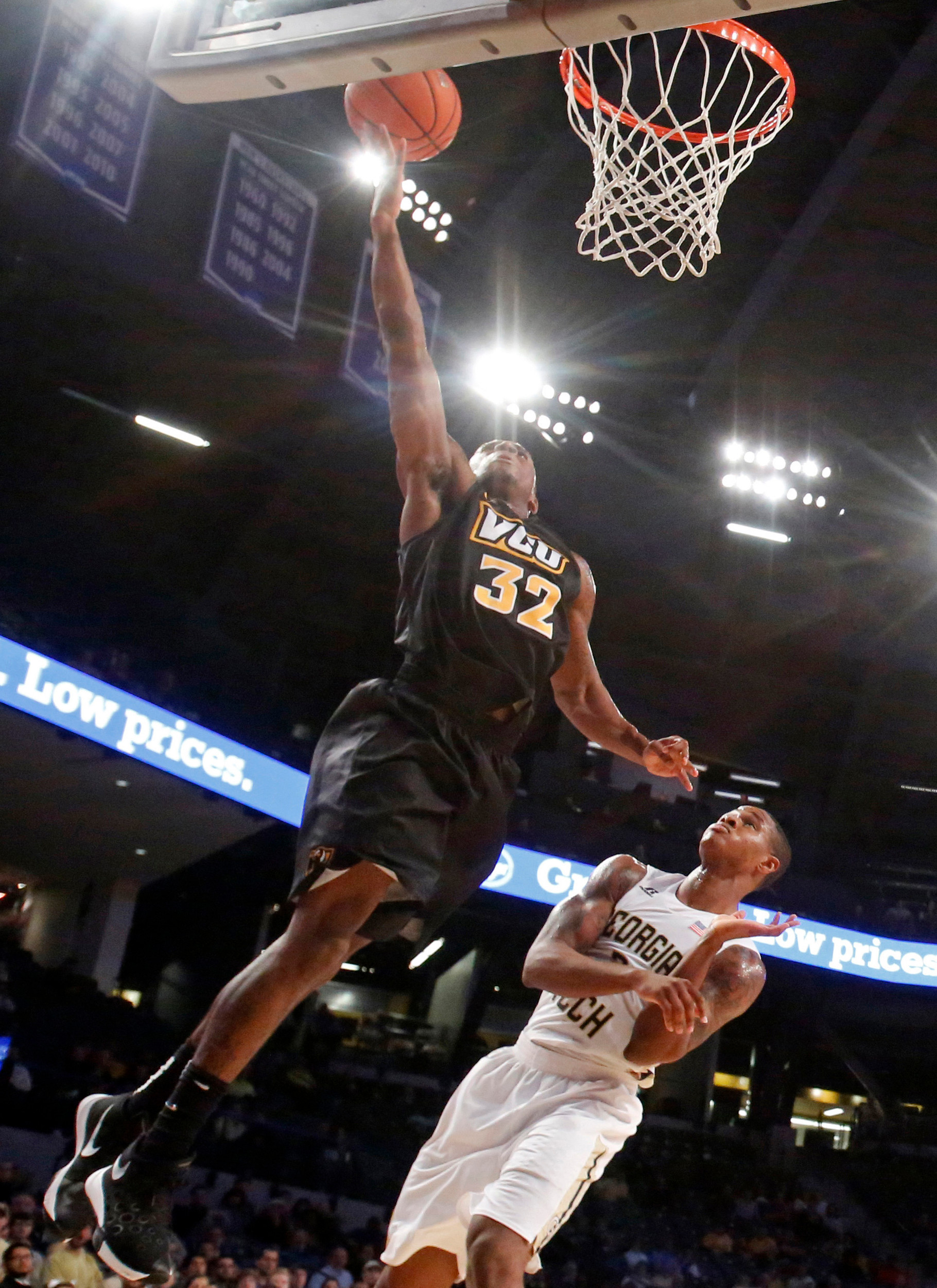 VCU Rams guard Melvin Johnson makes a layup against Georgia Tech guard Marcus Georges-Hunt in the first half of their game at McCamish Pavilion. Credit: Jason Getz-USA TODAY Sports