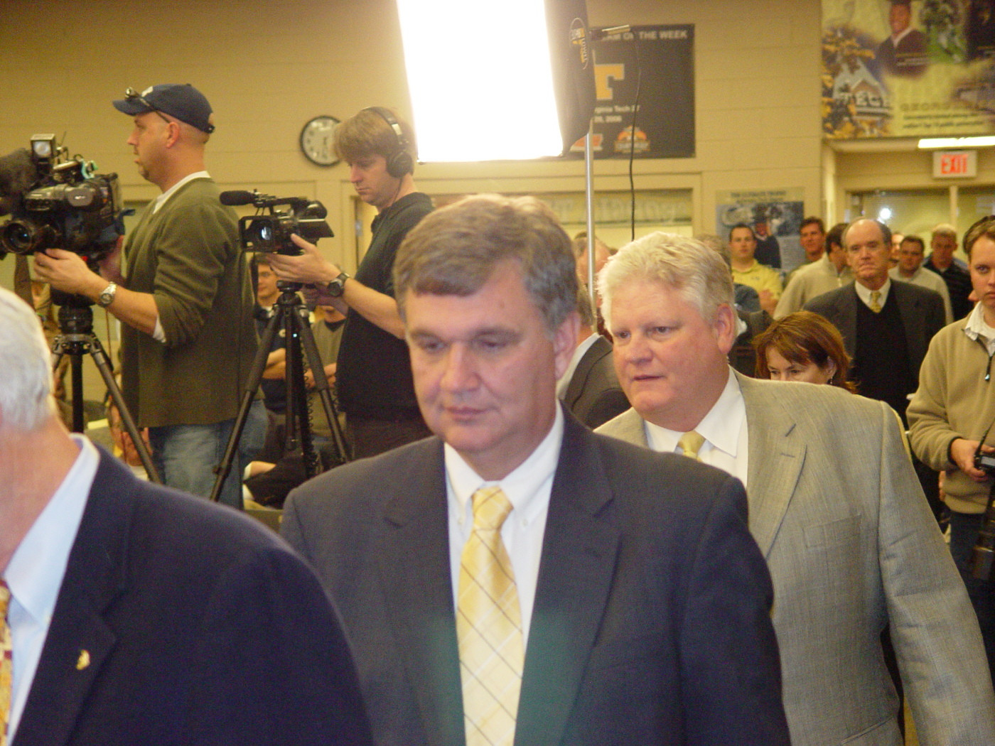 Johnson enters the Players Lounge for the press conference.