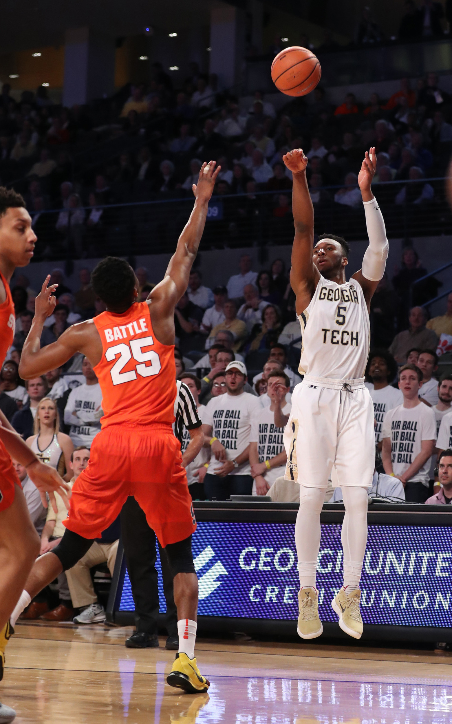 Jan 31, 2018; Atlanta, GA, USA; Georgia Tech Yellow Jackets guard Josh Okogie (5) shoots a three point shot against Syracuse Orange guard Tyus Battle (25) during the first half at McCamish Pavilion. Mandatory Credit: Jason Getz-USA TODAY Sports