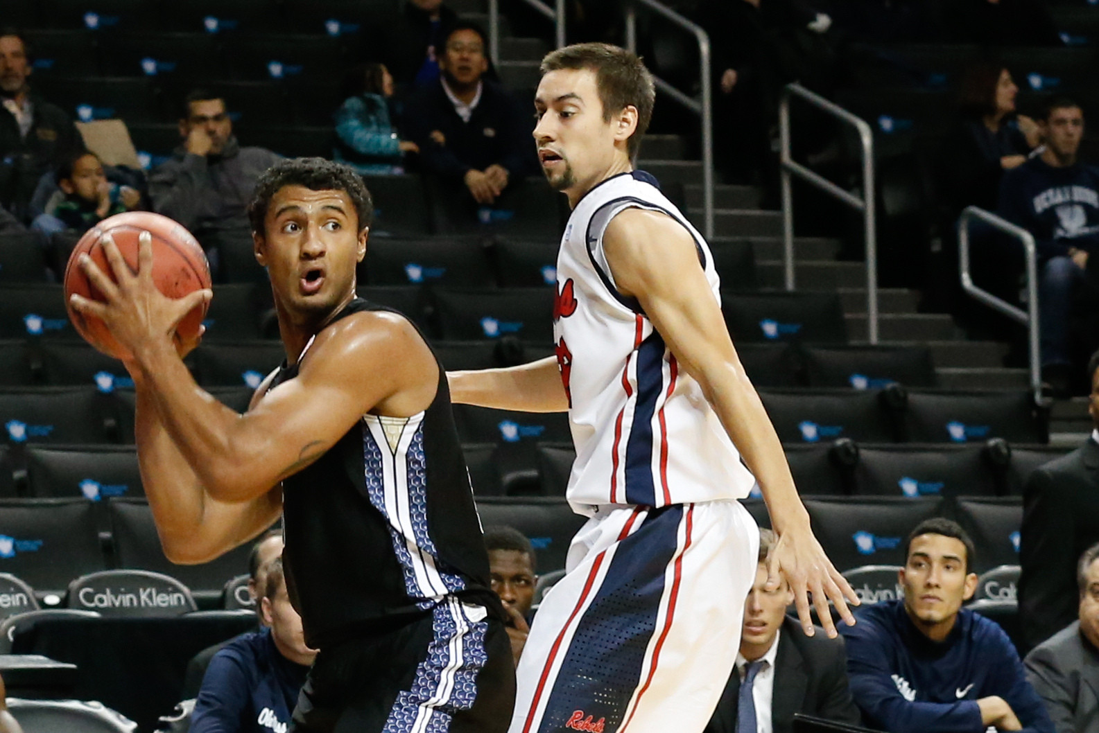 Nov 29, 2013; Brooklyn, NY, USA; Georgia Tech Yellow Jackets guard Chris Bolden (11) looks to pass as Mississippi Rebels guard Marshall Henderson (22) falls off defense during the first half at Barclays Center. Mandatory Credit: Anthony Gruppuso-USA TODAY Sports