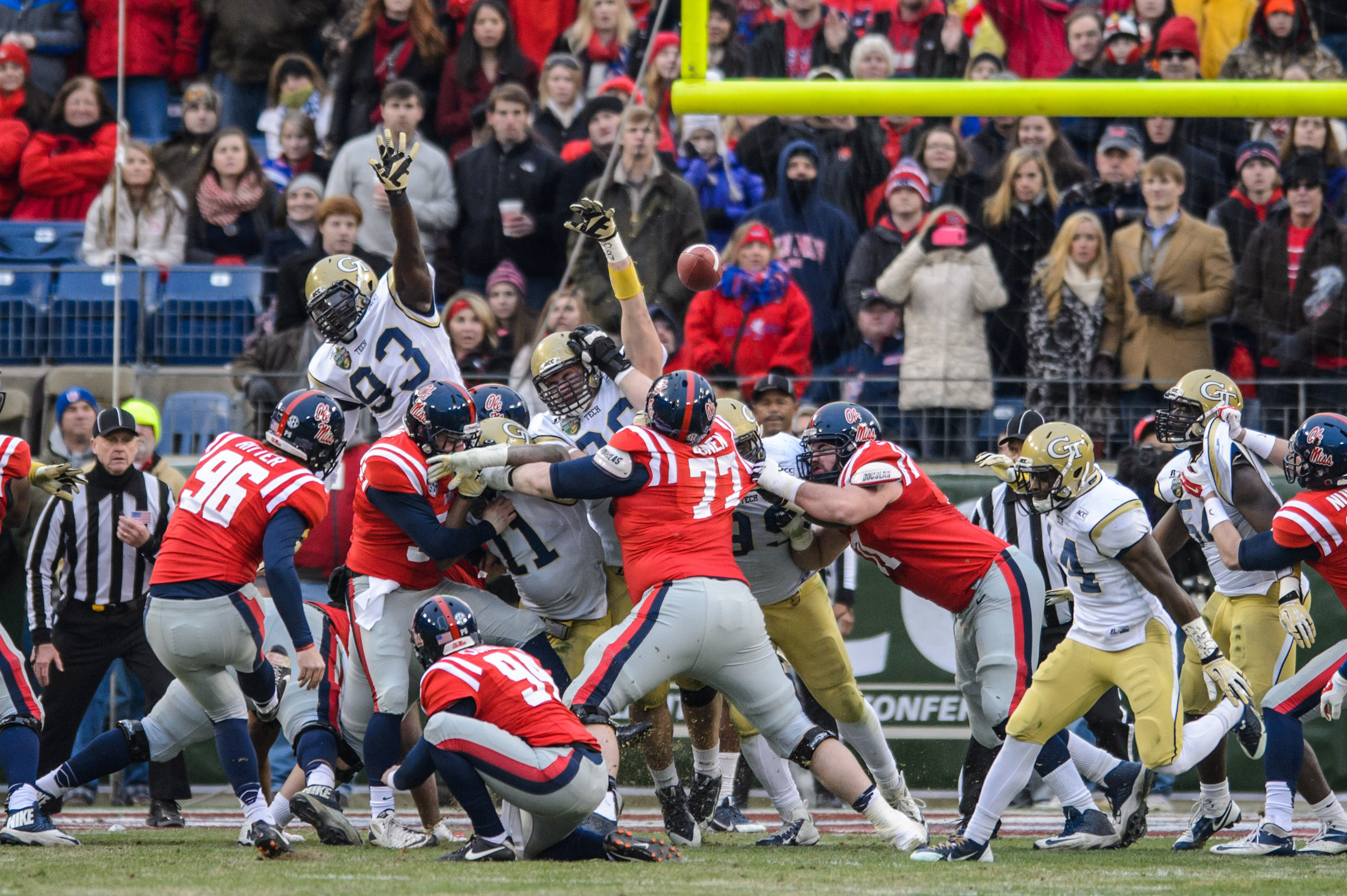 Adam Gotsis (96) blocks a PAT