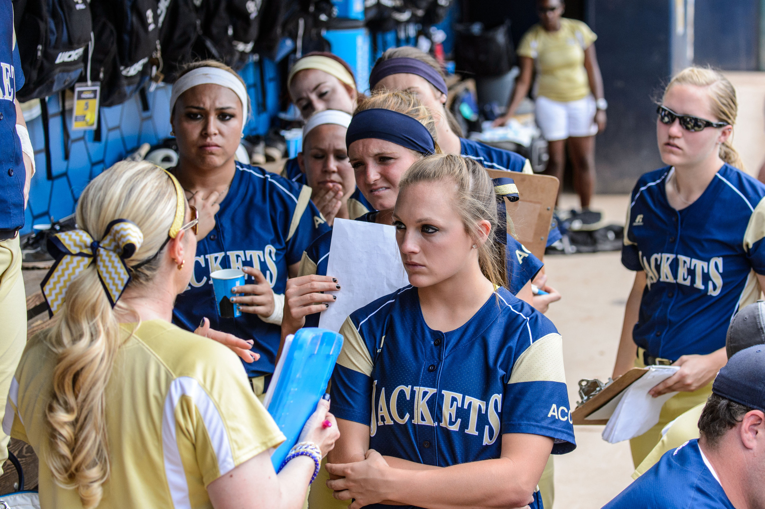 Coach Hoerner speaks to the team in the dugout