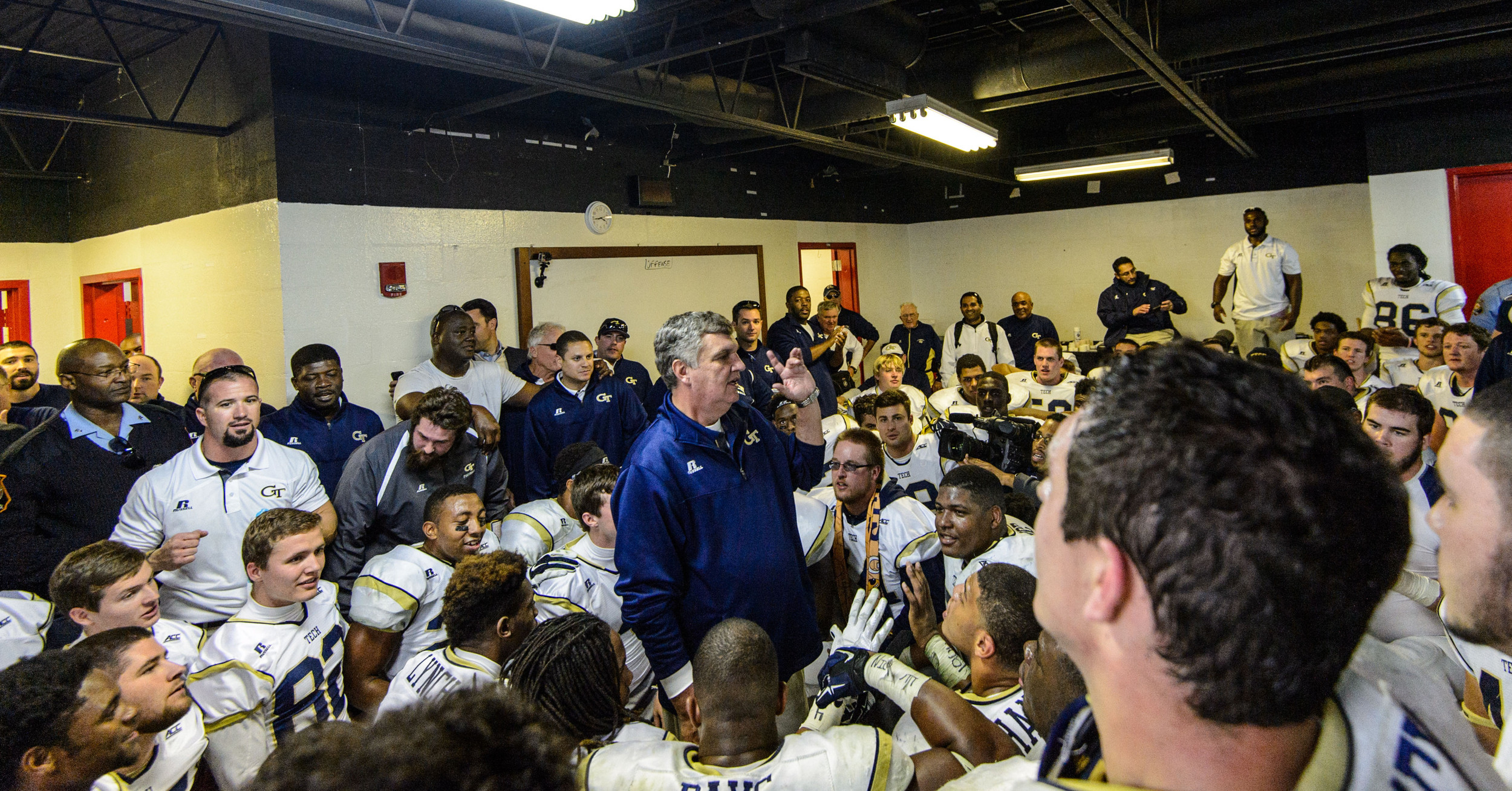 Coach Johnson speaks to the team after the win