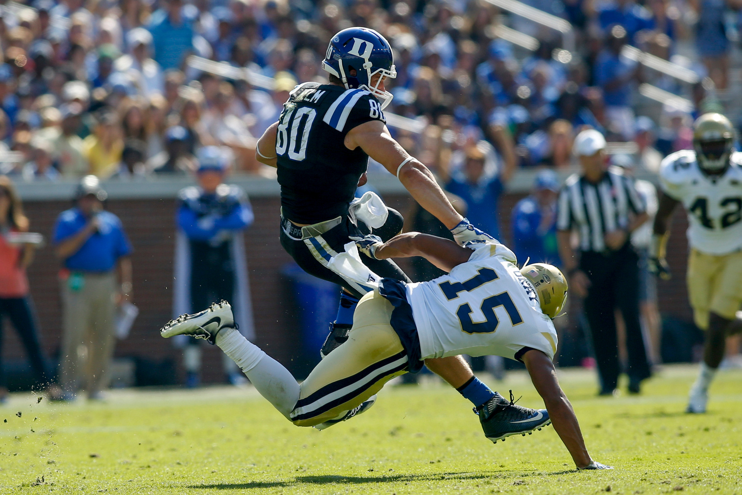 Blue Devils tight end Daniel Helm (80) is tackled by Yellow Jackets defensive back A.J. Gray (15) in the second quarter. Brett Davis-USA TODAY Sports