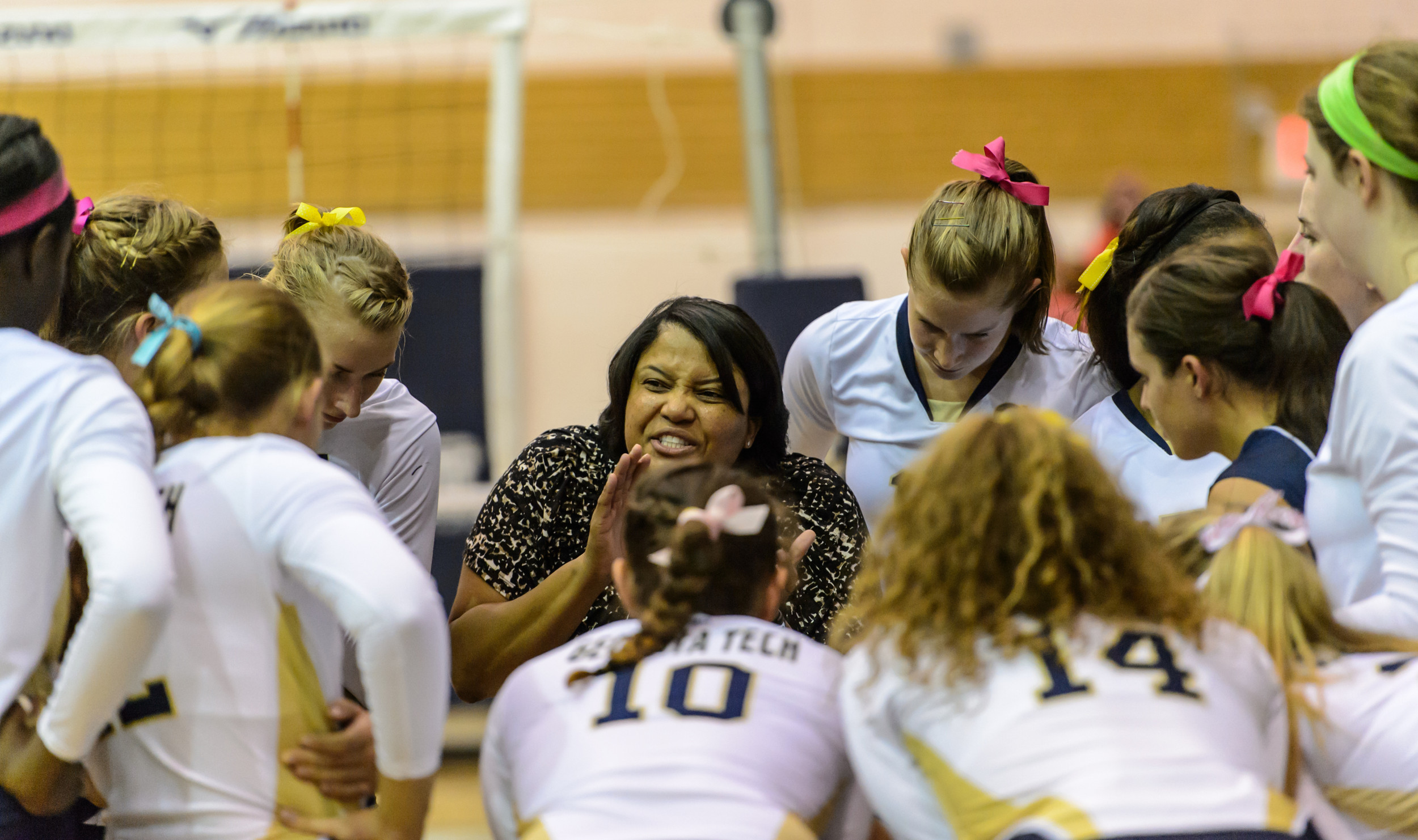Coach Tonya Johnson speaks to the team during a timeout.