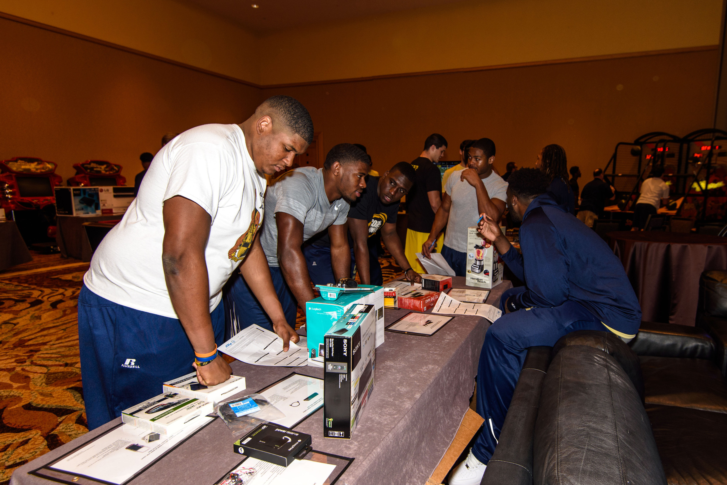 The Yellow Jackets perused the Orange Bowl Gift Suite