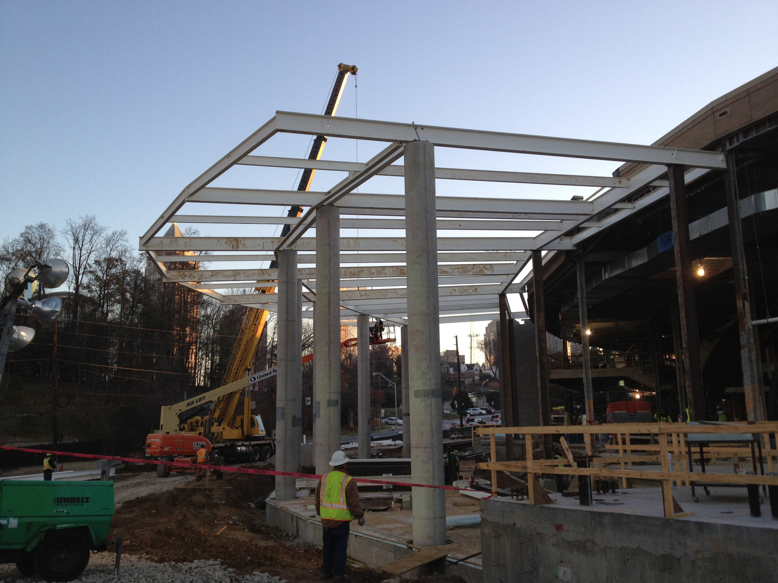 Iron Workers installing steel structure on the exterior of McCamish Pavilion - 12/2/11