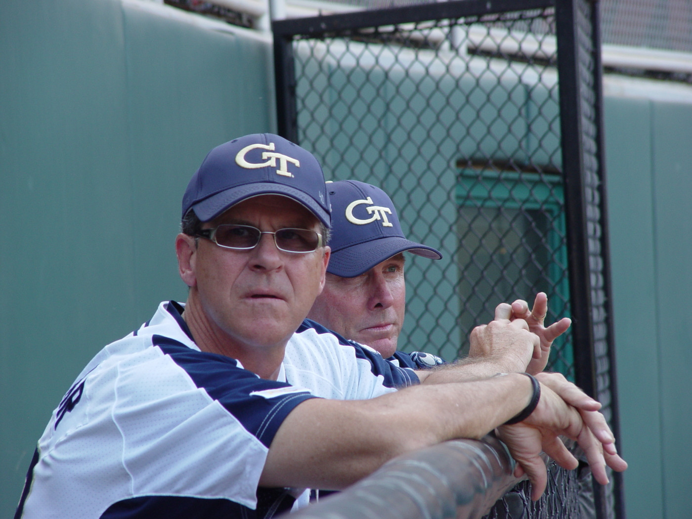 Pitching coach Tom Kinkelaar and head coach Danny Hall watch Louisville infield practice at the NCAA baseball regional, May 30, 2008.