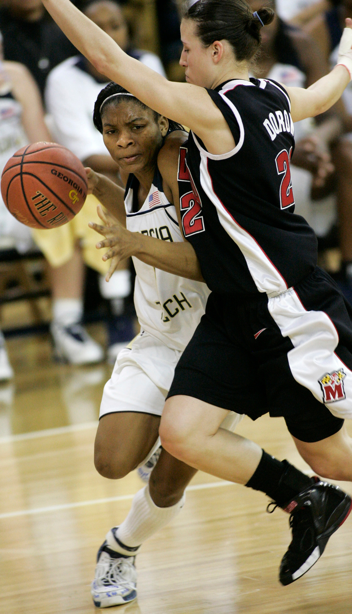 Georgia Tech guard Jacqua Williams' left, tries to get by Maryland guard Shay Doron during the second half of their women's basketball game Thursday, Febuary 1, 2007, in Atlanta. Georgia Tech won, 77-72.(AP Photo/John Amis)