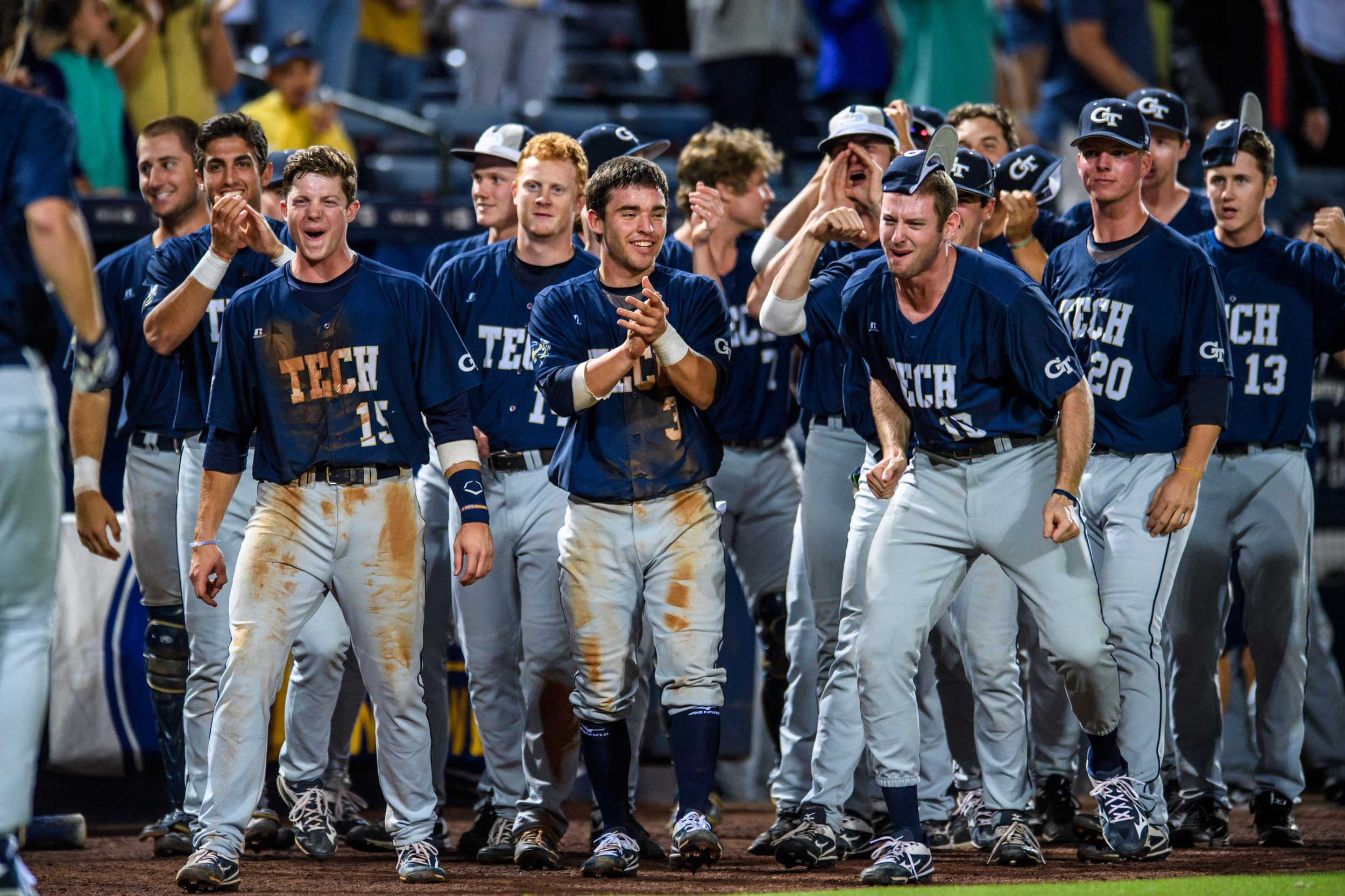 The team awaits Kel Johnson after his home run