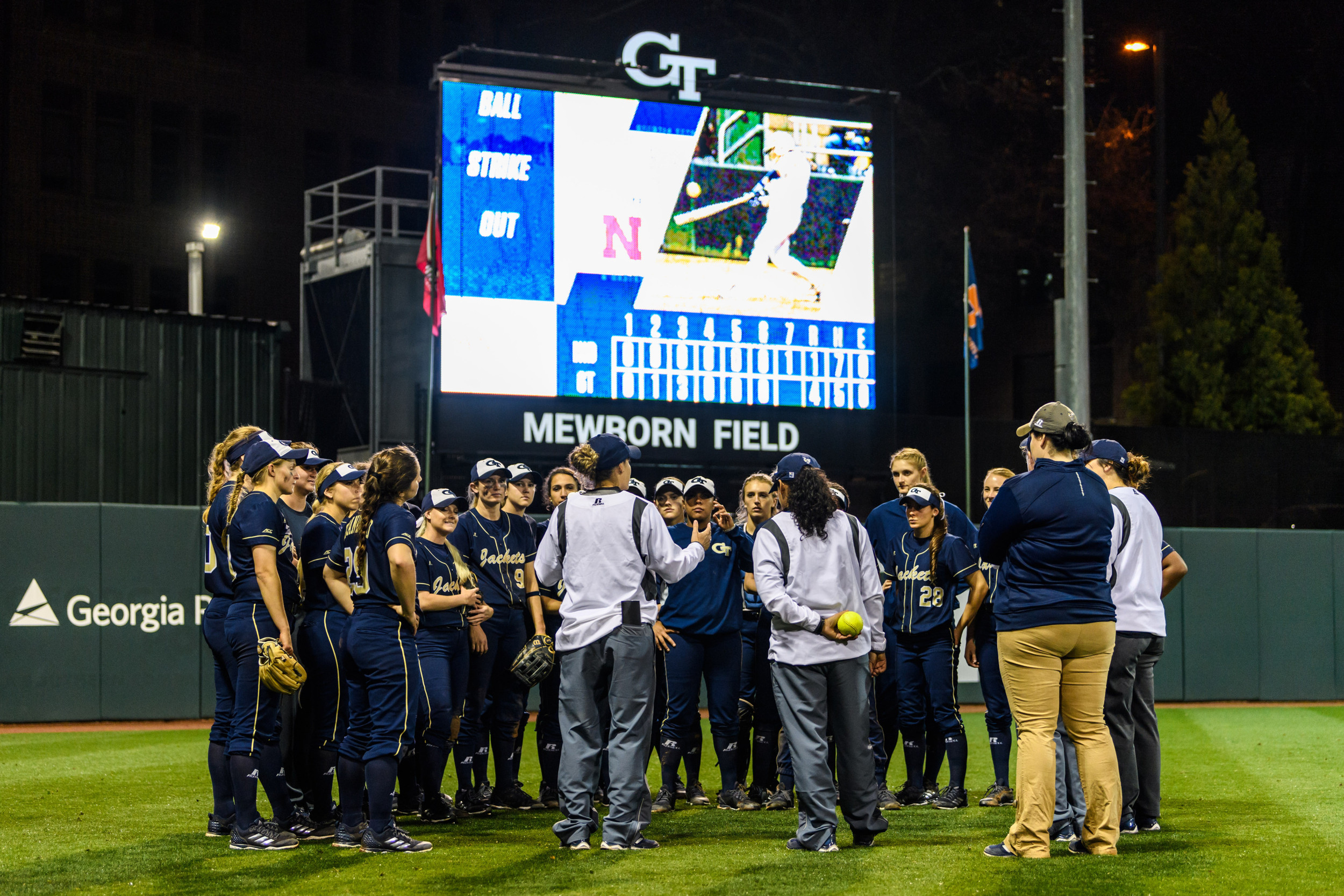 Coach Morales talks to the team after the win