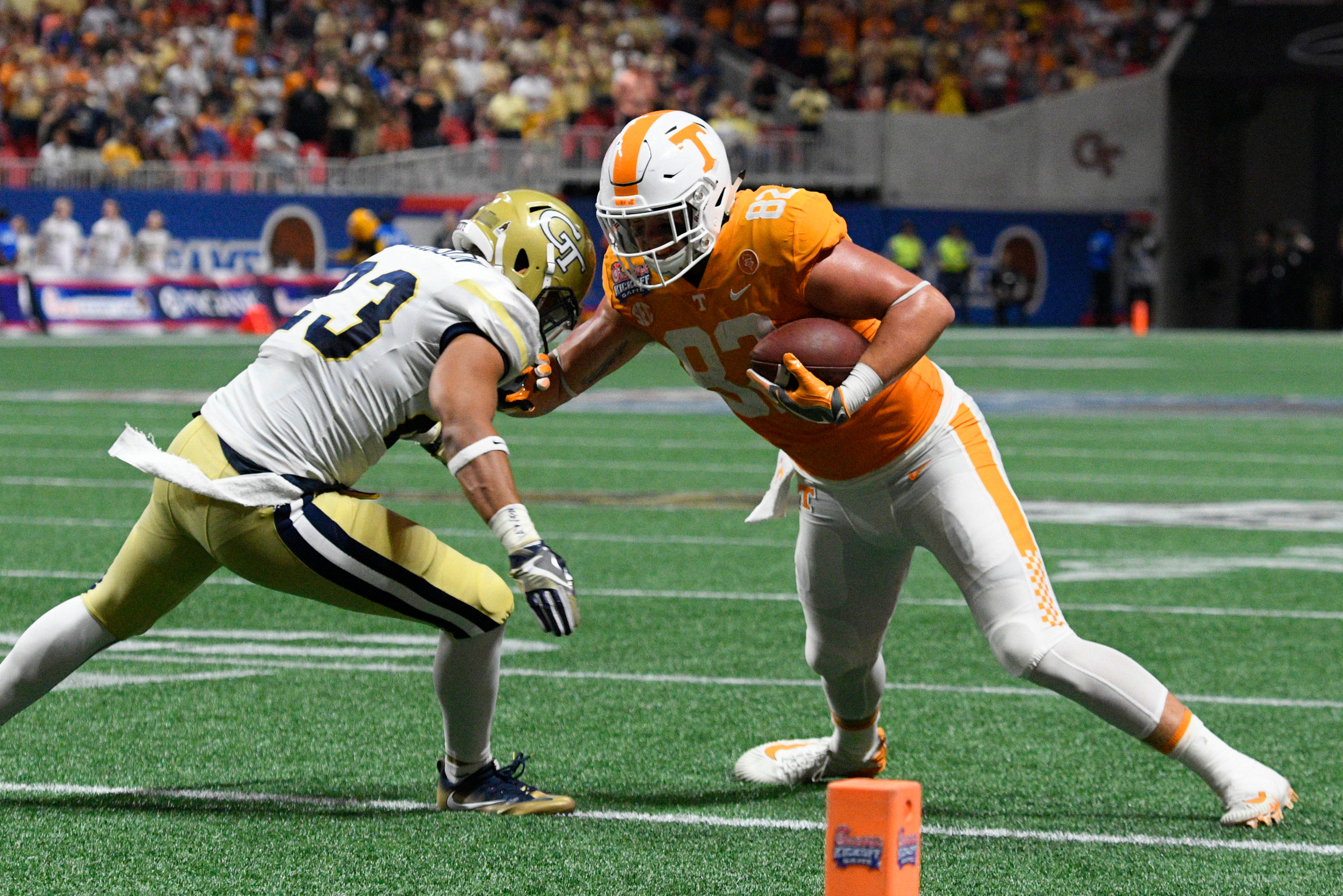 Sep 4, 2017; Atlanta, GA, USA;Georgia Tech Yellow Jackets defensive back Jalen Johnson (23) tackles Tennessee Volunteers tight end Ethan Wolf (82) after a pass reception during the second quarter at Mercedes-Benz Stadium. Mandatory Credit: Dale Zanine-USA TODAY Sports