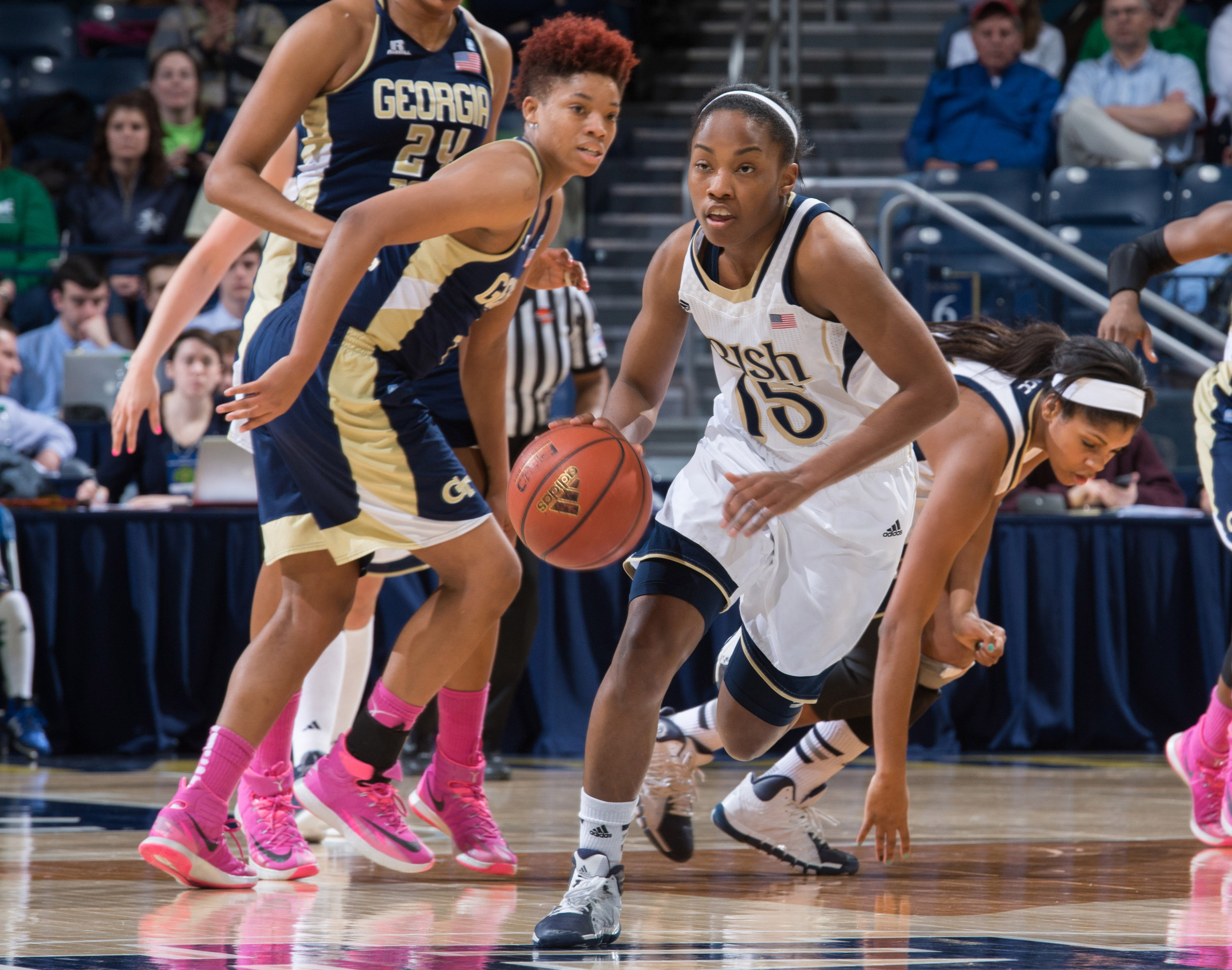 Feb 17, 2014; South Bend, IN, USA; Notre Dame Fighting Irish guard Lindsay Allen (15) dribbles the ball in front of Georgia Tech Yellow Jackets guard Aaliyah Whiteside (2) in the second half at the Purcell Pavilion. Mandatory Credit: Matt Cashore-USA TODAY Sports