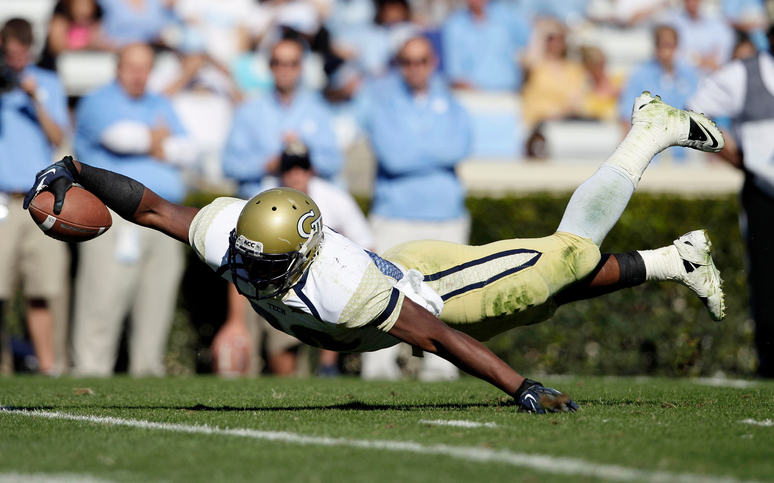Georgia Tech's David Sims dives into the end zone for a touchdown against North Carolina during the first half. (AP Photo/Gerry Broome)