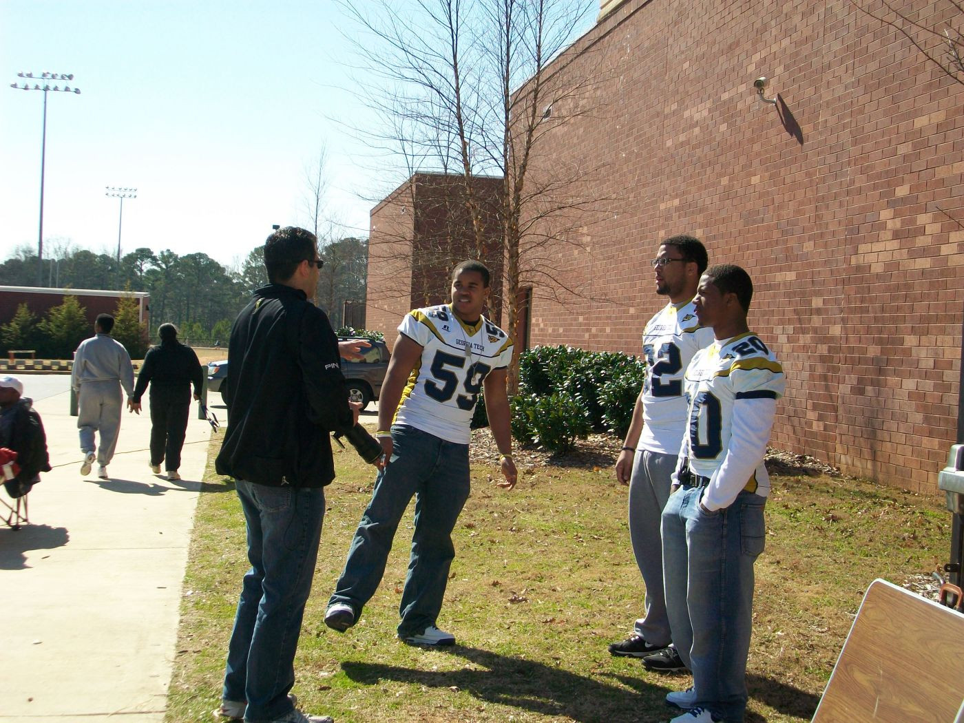 Georgia Tech football players Jason Peters, Roddy Jones and Kyle Jackson worked with local young kids Feb. 21 at the Heat Track Club Fun Run.