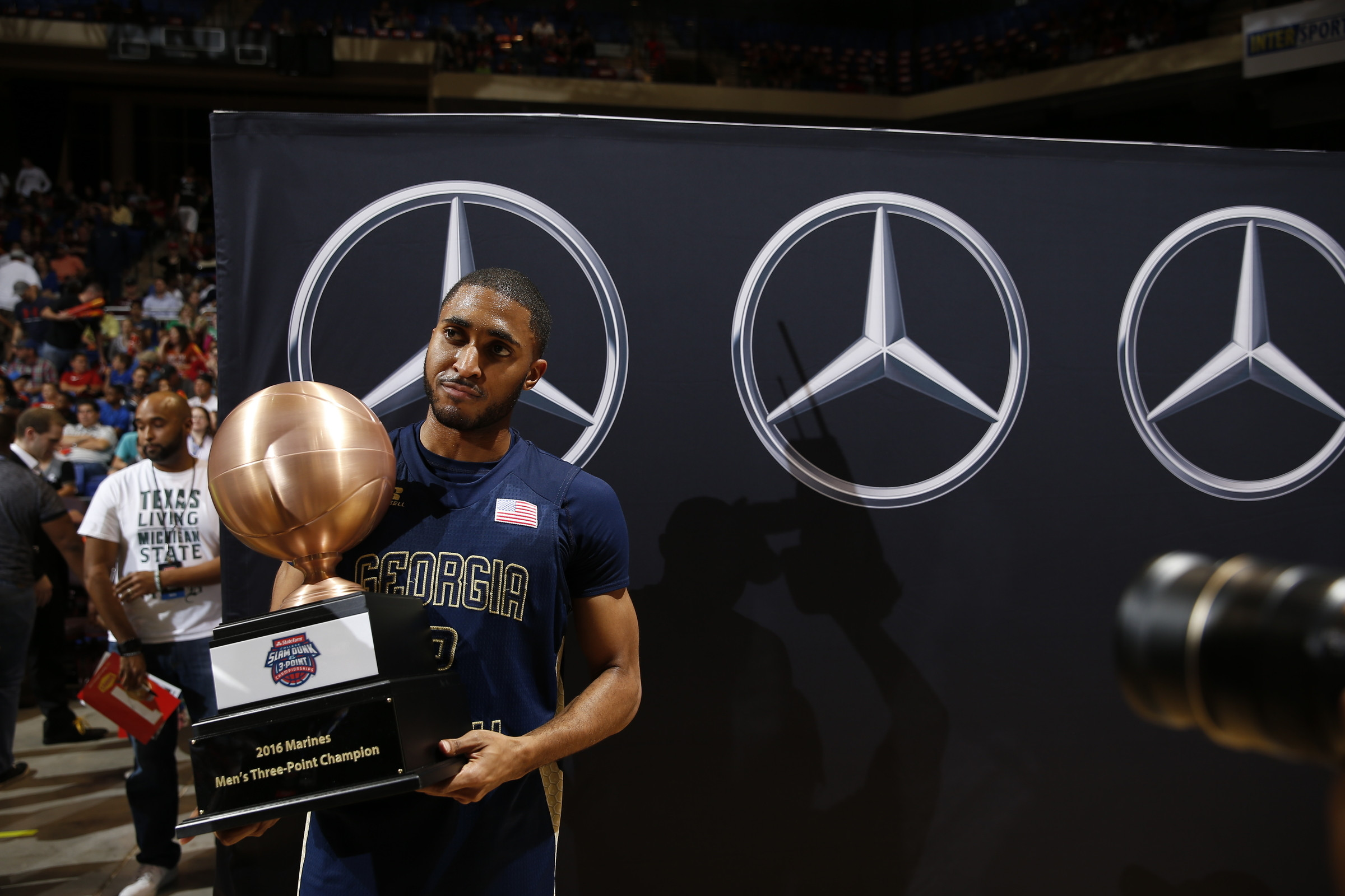 Adam Smith shows off his trophy at the 2016 State Farm 3-Point Championship.