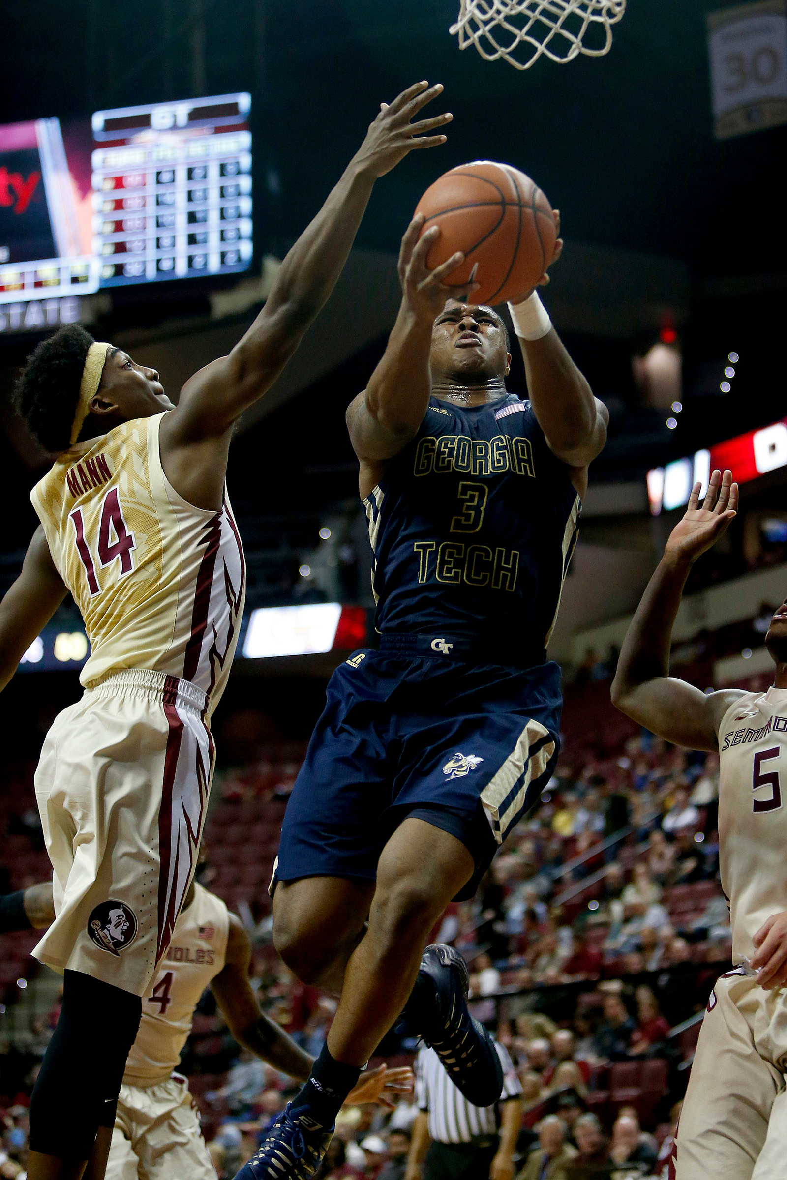 Marcus Georges-Hunt scores against Florida State Seminoles guard Terance Mann. Glenn Beil-USA TODAY Sports