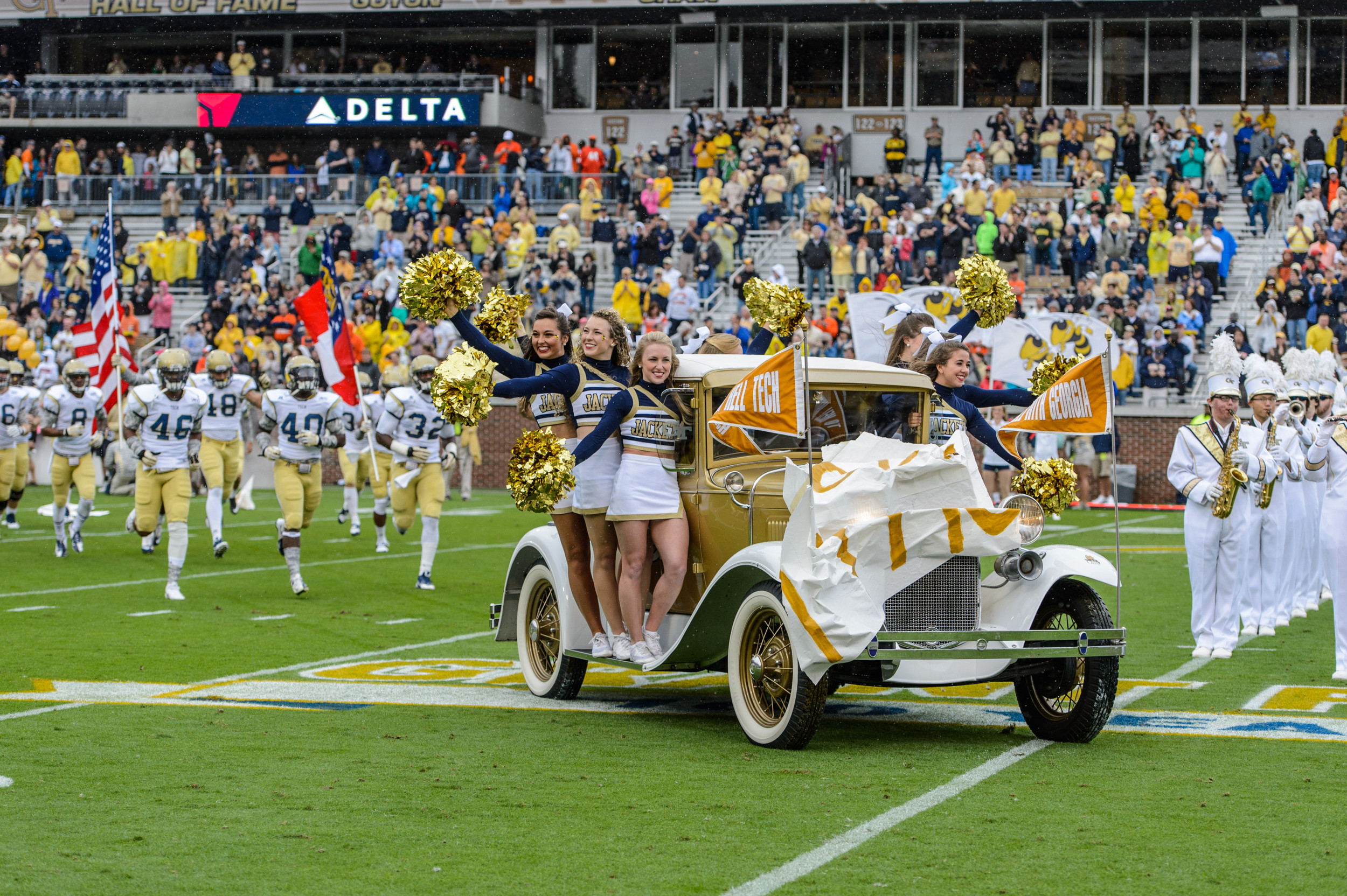 The Ramblin' Reck leads the team onto Historic Grant Field at Bobby Dodd Stadium