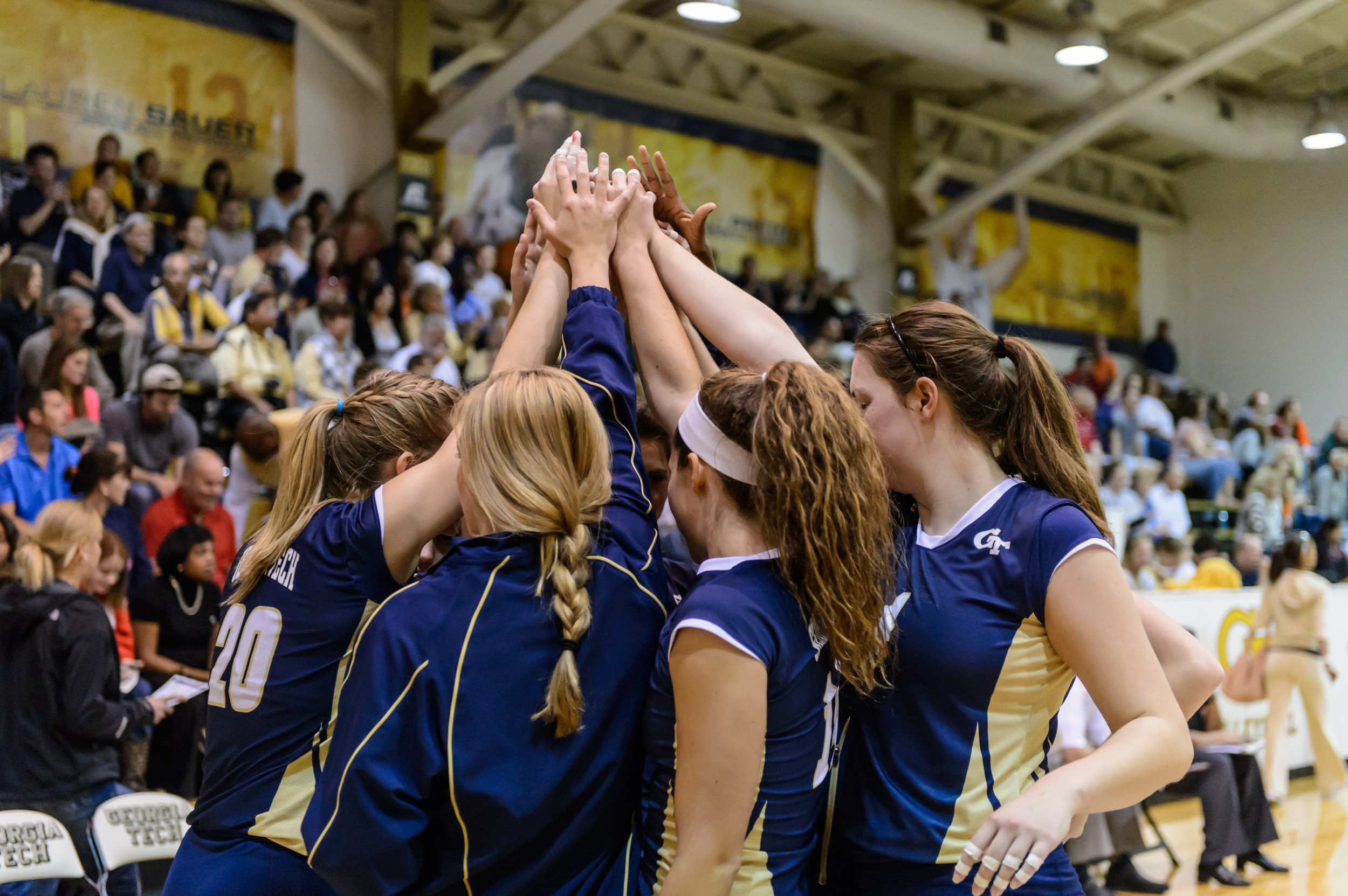 The non-starters huddle before the match.
