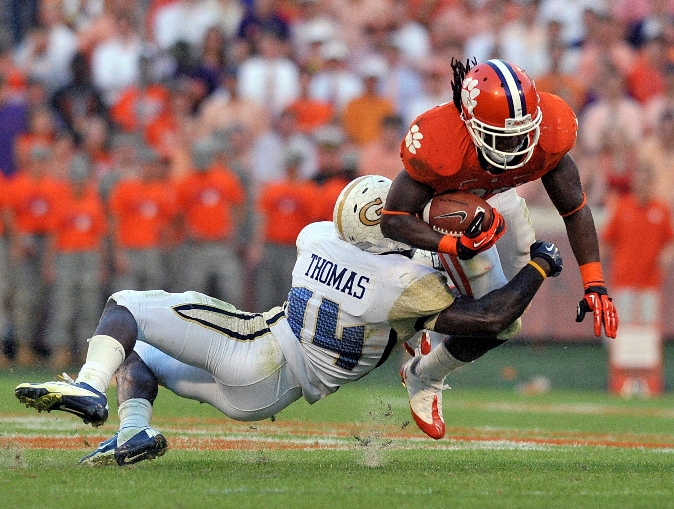 Clemson running back Andre Ellington runs through the tackle of Georgia Tech's Jemea Thomas during the second half. (AP Photo/ Richard Shiro)